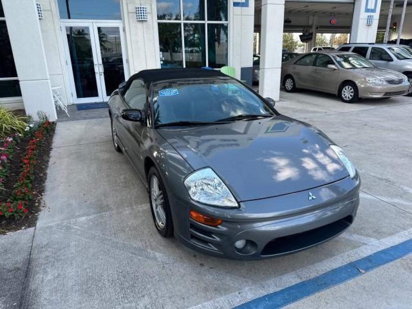 2004 Titanium Pearl /Midnight Mitsubishi Eclipse GTS SPYDER LOW MILES 36,896 CONV (4A3AE75H04E) with an 3.0L SOHC MPFI 24-Valve V6 Variable Induction Engine engine, Automatic transmission, located at 4701 North Dixie Hwy, Pompano Beach, FL, 33064, (954) 422-2889, 26.240938, -80.123474 - OUR WEBPAGE FLORIDACARS1.COM HAS OVER 100 PHOTOS AND FREE CARFAX LINK 2004 MITSUBISHI ECLIPSE SPYDER GTS VIN: 4A3AE75H04E031350 CONVERTIBLE 3.0L V6 F DOHC 24V GASOLINE FRONT WHEEL DRIVE THIS IS ONE OF THE NICEST MITSUBISHI S WE HAVE EVER LISTED, CLEAN FLORIDA TITLE. BRAND NEW THIS VEHICLE COST $27,2 - Photo#1