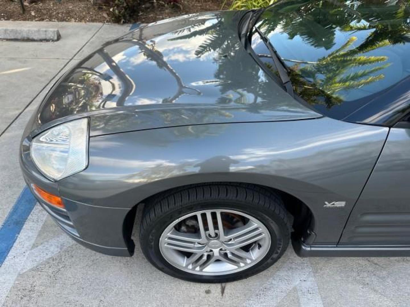 2004 Titanium Pearl /Midnight Mitsubishi Eclipse GTS SPYDER LOW MILES 36,896 CONV (4A3AE75H04E) with an 3.0L SOHC MPFI 24-Valve V6 Variable Induction Engine engine, Automatic transmission, located at 4701 North Dixie Hwy, Pompano Beach, FL, 33064, (954) 422-2889, 26.240938, -80.123474 - OUR WEBPAGE FLORIDACARS1.COM HAS OVER 100 PHOTOS AND FREE CARFAX LINK 2004 MITSUBISHI ECLIPSE SPYDER GTS VIN: 4A3AE75H04E031350 CONVERTIBLE 3.0L V6 F DOHC 24V GASOLINE FRONT WHEEL DRIVE THIS IS ONE OF THE NICEST MITSUBISHI S WE HAVE EVER LISTED, CLEAN FLORIDA TITLE. BRAND NEW THIS VEHICLE COST $27,2 - Photo#39