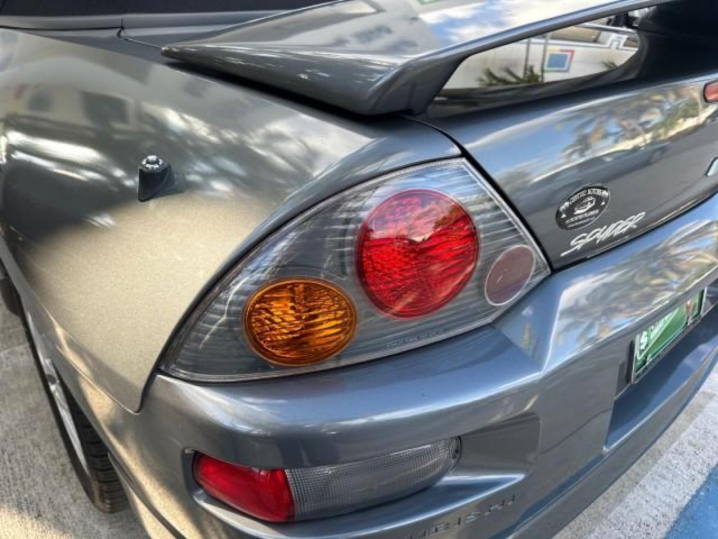 2004 Titanium Pearl /Midnight Mitsubishi Eclipse GTS SPYDER LOW MILES 36,896 CONV (4A3AE75H04E) with an 3.0L SOHC MPFI 24-Valve V6 Variable Induction Engine engine, Automatic transmission, located at 4701 North Dixie Hwy, Pompano Beach, FL, 33064, (954) 422-2889, 26.240938, -80.123474 - OUR WEBPAGE FLORIDACARS1.COM HAS OVER 100 PHOTOS AND FREE CARFAX LINK 2004 MITSUBISHI ECLIPSE SPYDER GTS VIN: 4A3AE75H04E031350 CONVERTIBLE 3.0L V6 F DOHC 24V GASOLINE FRONT WHEEL DRIVE THIS IS ONE OF THE NICEST MITSUBISHI S WE HAVE EVER LISTED, CLEAN FLORIDA TITLE. BRAND NEW THIS VEHICLE COST $27,2 - Photo#47