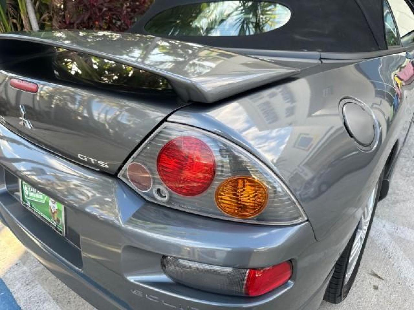 2004 Titanium Pearl /Midnight Mitsubishi Eclipse GTS SPYDER LOW MILES 36,896 CONV (4A3AE75H04E) with an 3.0L SOHC MPFI 24-Valve V6 Variable Induction Engine engine, Automatic transmission, located at 4701 North Dixie Hwy, Pompano Beach, FL, 33064, (954) 422-2889, 26.240938, -80.123474 - OUR WEBPAGE FLORIDACARS1.COM HAS OVER 100 PHOTOS AND FREE CARFAX LINK 2004 MITSUBISHI ECLIPSE SPYDER GTS VIN: 4A3AE75H04E031350 CONVERTIBLE 3.0L V6 F DOHC 24V GASOLINE FRONT WHEEL DRIVE THIS IS ONE OF THE NICEST MITSUBISHI S WE HAVE EVER LISTED, CLEAN FLORIDA TITLE. BRAND NEW THIS VEHICLE COST $27,2 - Photo#51