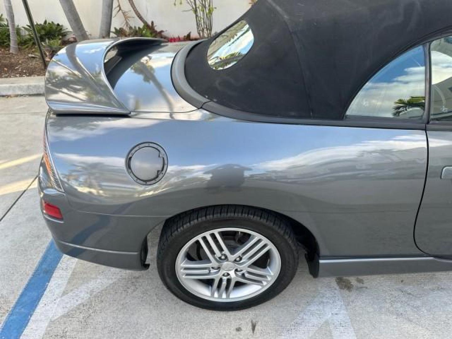 2004 Titanium Pearl /Midnight Mitsubishi Eclipse GTS SPYDER LOW MILES 36,896 CONV (4A3AE75H04E) with an 3.0L SOHC MPFI 24-Valve V6 Variable Induction Engine engine, Automatic transmission, located at 4701 North Dixie Hwy, Pompano Beach, FL, 33064, (954) 422-2889, 26.240938, -80.123474 - OUR WEBPAGE FLORIDACARS1.COM HAS OVER 100 PHOTOS AND FREE CARFAX LINK 2004 MITSUBISHI ECLIPSE SPYDER GTS VIN: 4A3AE75H04E031350 CONVERTIBLE 3.0L V6 F DOHC 24V GASOLINE FRONT WHEEL DRIVE THIS IS ONE OF THE NICEST MITSUBISHI S WE HAVE EVER LISTED, CLEAN FLORIDA TITLE. BRAND NEW THIS VEHICLE COST $27,2 - Photo#56