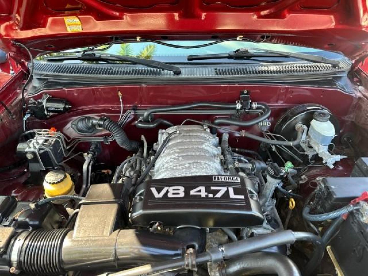 2003 Salsa Red Pearl /Gray Toyota Tundra SR5 1 OWNER FL TITLE 31 SERVICES (5TBRT34163S) with an 4.7L DOHC EFI 32-Valve V8 i-Force Engine engine, Automatic transmission, located at 4701 North Dixie Hwy, Pompano Beach, FL, 33064, (954) 422-2889, 26.240938, -80.123474 - 2003 TOYOTA TUNDRA SR5 VIN: 5TBRT34163S368762 4 DOOR EXTENDED CAB PICKUP 4.7L V8 F DOHC 32V GASOLINE REAR WHEEL DRIVE Highlighted Features Bed Liner Cloth Seats ABS Brakes Automatic Transmission Power Locks AM/FM Stereo CD Audio Power Mirrors Air Conditioning Cassette Player Power Windows Presenting - Photo#19