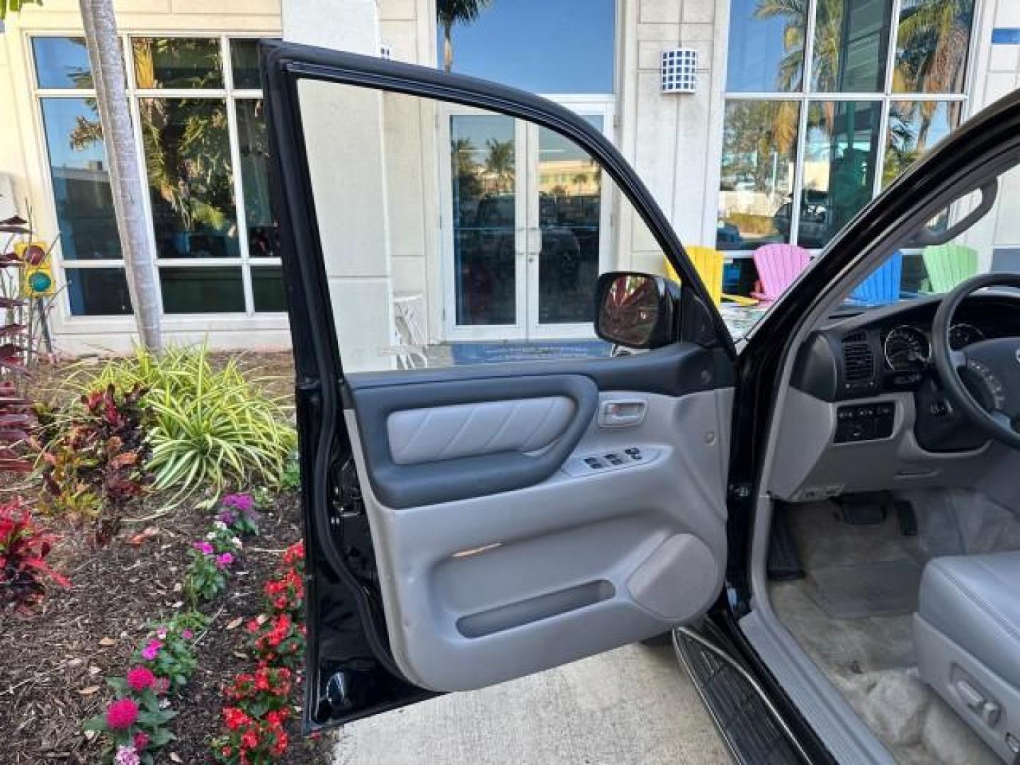 2003 Black Garnet Pearl /Stone Toyota Land Cruiser 4X4 18 SERVICE RECORDS NEW TIMING (JTEHT05JX32) with an 4.7L DOHC EFI 32-Valve V8 Engine engine, Automatic transmission, located at 4701 North Dixie Hwy, Pompano Beach, FL, 33064, (954) 422-2889, 26.240938, -80.123474 - OUR WEBPAGE FLORIDACARS1.COM HAS OVER 100 PHOTOS AND FREE CARFAX LINK 2003 TOYOTA LAND CRUISER VIN: JTEHT05JX32048900 J T E H T 0 5 J X 3 2 0 4 8 9 0 0 4 DOOR WAGON/SPORT UTILITY 4.7L V8 F DOHC 32V GASOLINE ALL WHEEL DRIVE NEW TIMING 10/17/2019 124,356 Toyota of Deerfield Beach Deerfield Beach, Flor - Photo#9