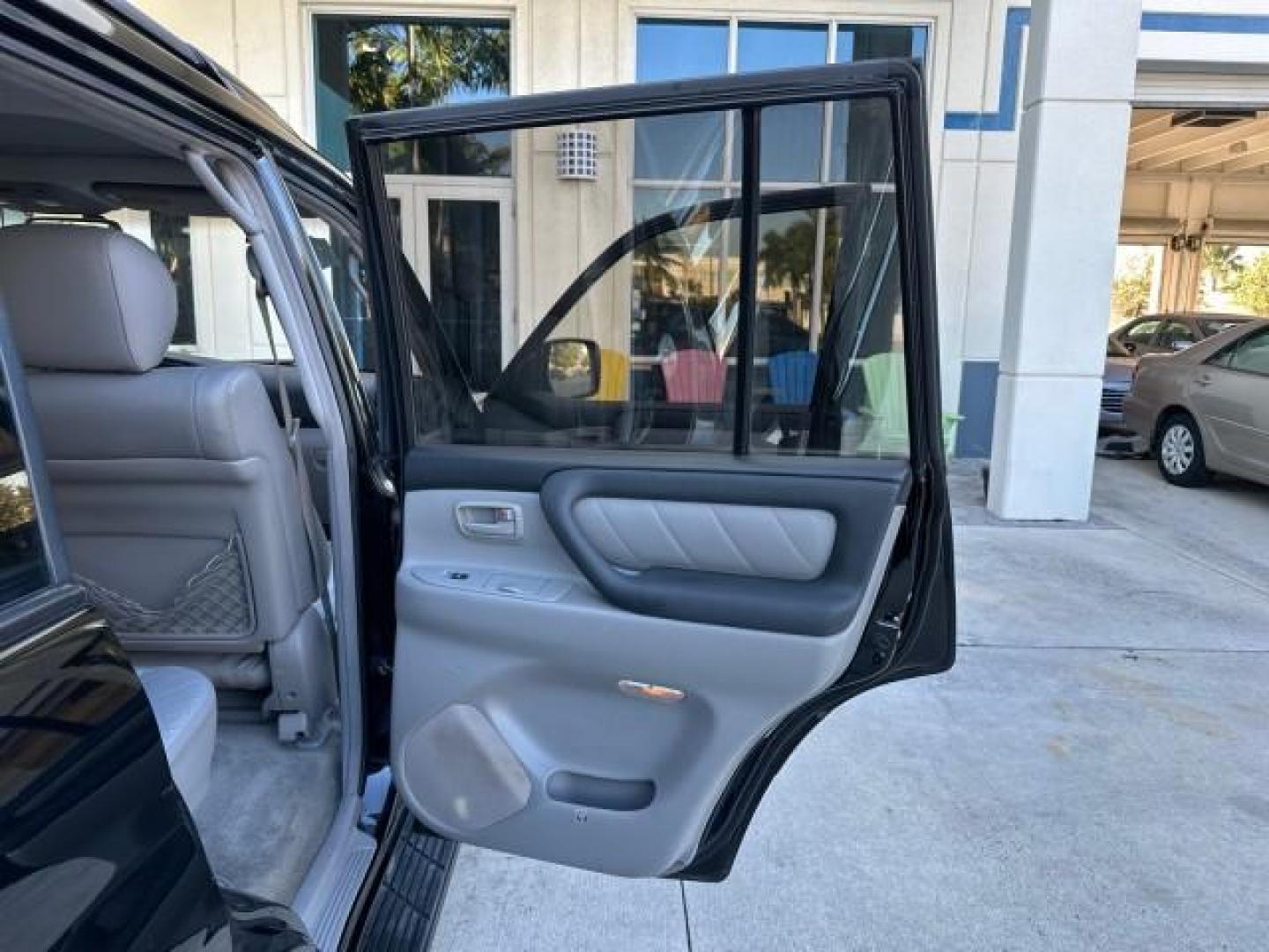 2003 Black Garnet Pearl /Stone Toyota Land Cruiser 4X4 18 SERVICE RECORDS NEW TIMING (JTEHT05JX32) with an 4.7L DOHC EFI 32-Valve V8 Engine engine, Automatic transmission, located at 4701 North Dixie Hwy, Pompano Beach, FL, 33064, (954) 422-2889, 26.240938, -80.123474 - OUR WEBPAGE FLORIDACARS1.COM HAS OVER 100 PHOTOS AND FREE CARFAX LINK 2003 TOYOTA LAND CRUISER VIN: JTEHT05JX32048900 J T E H T 0 5 J X 3 2 0 4 8 9 0 0 4 DOOR WAGON/SPORT UTILITY 4.7L V8 F DOHC 32V GASOLINE ALL WHEEL DRIVE NEW TIMING 10/17/2019 124,356 Toyota of Deerfield Beach Deerfield Beach, Flor - Photo#13