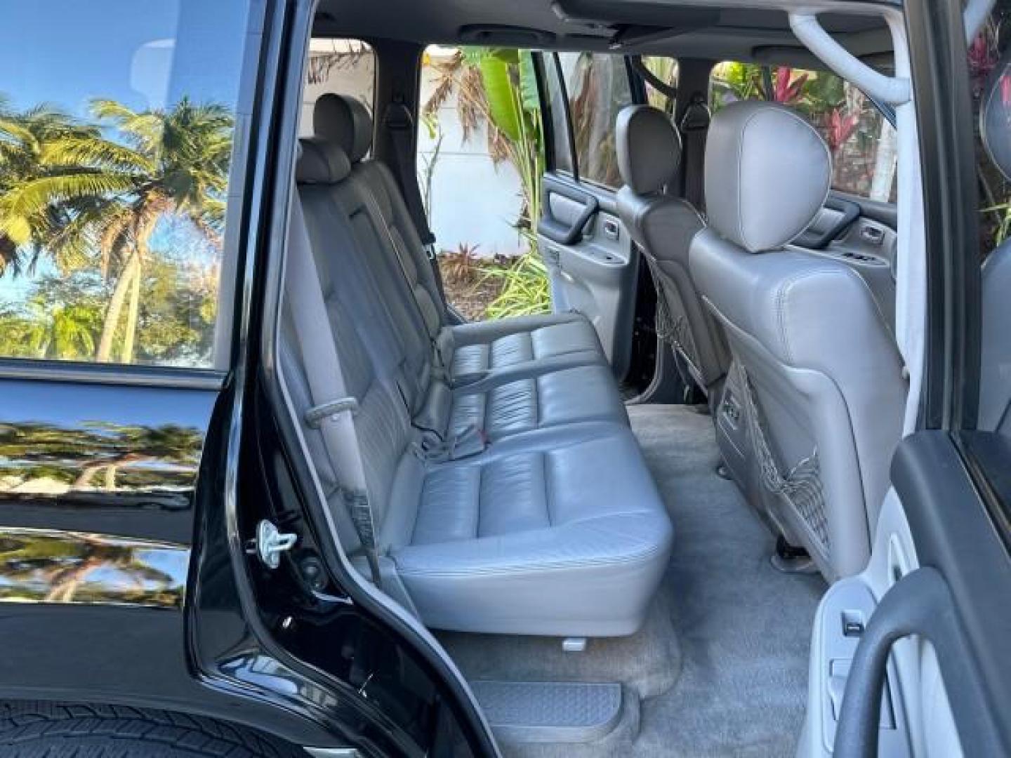 2003 Black Garnet Pearl /Stone Toyota Land Cruiser 4X4 18 SERVICE RECORDS NEW TIMING (JTEHT05JX32) with an 4.7L DOHC EFI 32-Valve V8 Engine engine, Automatic transmission, located at 4701 North Dixie Hwy, Pompano Beach, FL, 33064, (954) 422-2889, 26.240938, -80.123474 - OUR WEBPAGE FLORIDACARS1.COM HAS OVER 100 PHOTOS AND FREE CARFAX LINK 2003 TOYOTA LAND CRUISER VIN: JTEHT05JX32048900 J T E H T 0 5 J X 3 2 0 4 8 9 0 0 4 DOOR WAGON/SPORT UTILITY 4.7L V8 F DOHC 32V GASOLINE ALL WHEEL DRIVE NEW TIMING 10/17/2019 124,356 Toyota of Deerfield Beach Deerfield Beach, Flor - Photo#14