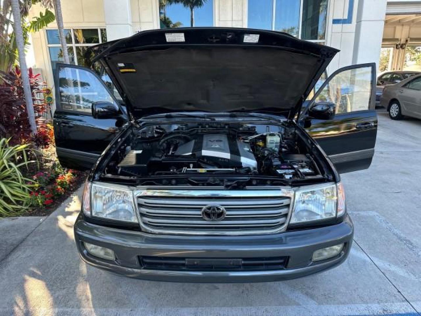 2003 Black Garnet Pearl /Stone Toyota Land Cruiser 4X4 18 SERVICE RECORDS NEW TIMING (JTEHT05JX32) with an 4.7L DOHC EFI 32-Valve V8 Engine engine, Automatic transmission, located at 4701 North Dixie Hwy, Pompano Beach, FL, 33064, (954) 422-2889, 26.240938, -80.123474 - OUR WEBPAGE FLORIDACARS1.COM HAS OVER 100 PHOTOS AND FREE CARFAX LINK 2003 TOYOTA LAND CRUISER VIN: JTEHT05JX32048900 J T E H T 0 5 J X 3 2 0 4 8 9 0 0 4 DOOR WAGON/SPORT UTILITY 4.7L V8 F DOHC 32V GASOLINE ALL WHEEL DRIVE NEW TIMING 10/17/2019 124,356 Toyota of Deerfield Beach Deerfield Beach, Flor - Photo#20