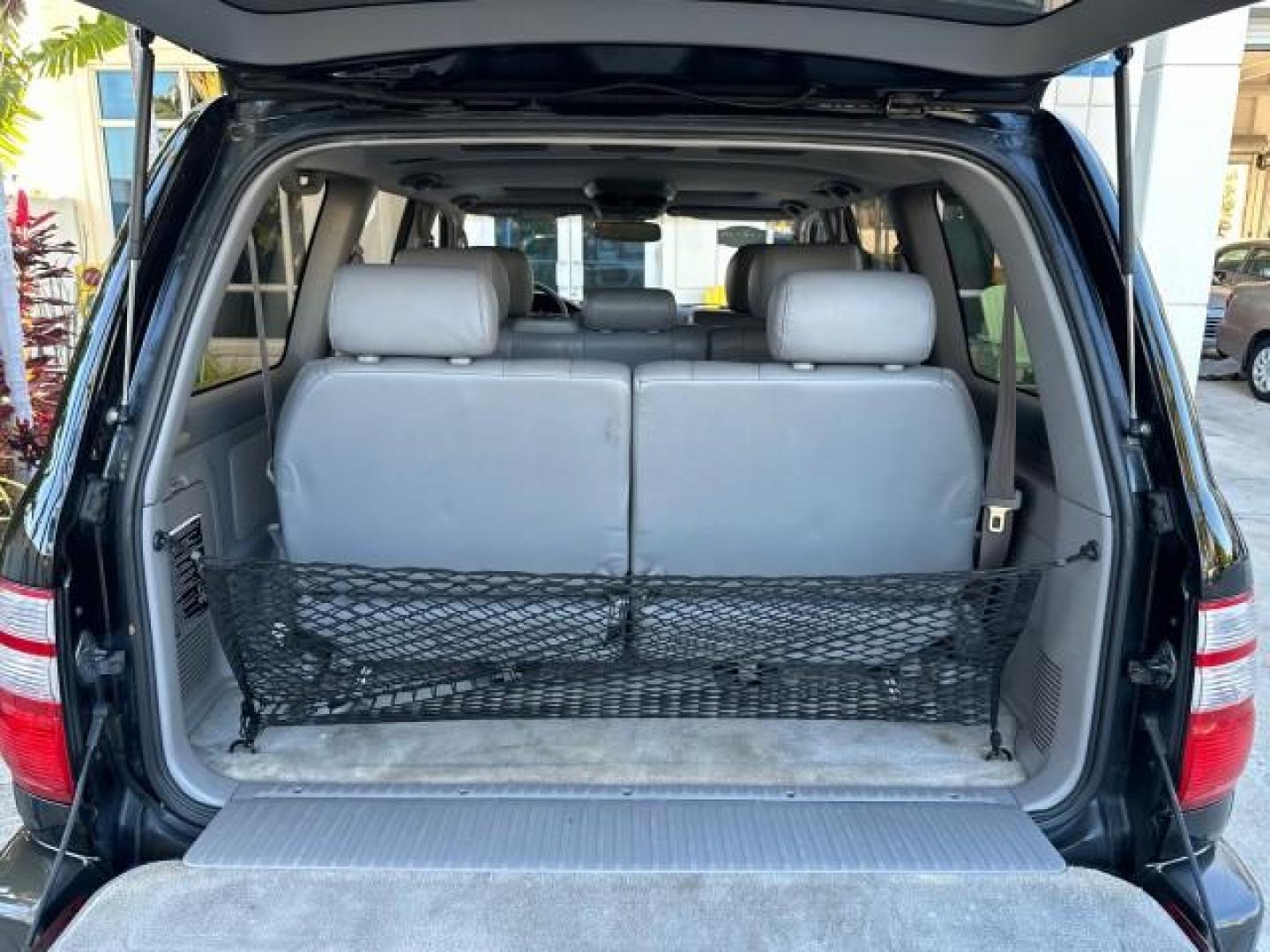 2003 Black Garnet Pearl /Stone Toyota Land Cruiser 4X4 18 SERVICE RECORDS NEW TIMING (JTEHT05JX32) with an 4.7L DOHC EFI 32-Valve V8 Engine engine, Automatic transmission, located at 4701 North Dixie Hwy, Pompano Beach, FL, 33064, (954) 422-2889, 26.240938, -80.123474 - OUR WEBPAGE FLORIDACARS1.COM HAS OVER 100 PHOTOS AND FREE CARFAX LINK 2003 TOYOTA LAND CRUISER VIN: JTEHT05JX32048900 J T E H T 0 5 J X 3 2 0 4 8 9 0 0 4 DOOR WAGON/SPORT UTILITY 4.7L V8 F DOHC 32V GASOLINE ALL WHEEL DRIVE NEW TIMING 10/17/2019 124,356 Toyota of Deerfield Beach Deerfield Beach, Flor - Photo#16
