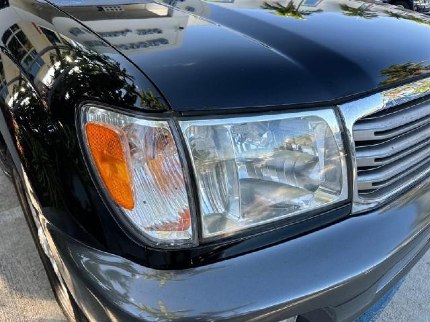 2003 Black Garnet Pearl /Stone Toyota Land Cruiser 4X4 18 SERVICE RECORDS NEW TIMING (JTEHT05JX32) with an 4.7L DOHC EFI 32-Valve V8 Engine engine, Automatic transmission, located at 4701 North Dixie Hwy, Pompano Beach, FL, 33064, (954) 422-2889, 26.240938, -80.123474 - OUR WEBPAGE FLORIDACARS1.COM HAS OVER 100 PHOTOS AND FREE CARFAX LINK 2003 TOYOTA LAND CRUISER VIN: JTEHT05JX32048900 J T E H T 0 5 J X 3 2 0 4 8 9 0 0 4 DOOR WAGON/SPORT UTILITY 4.7L V8 F DOHC 32V GASOLINE ALL WHEEL DRIVE NEW TIMING 10/17/2019 124,356 Toyota of Deerfield Beach Deerfield Beach, Flor - Photo#25