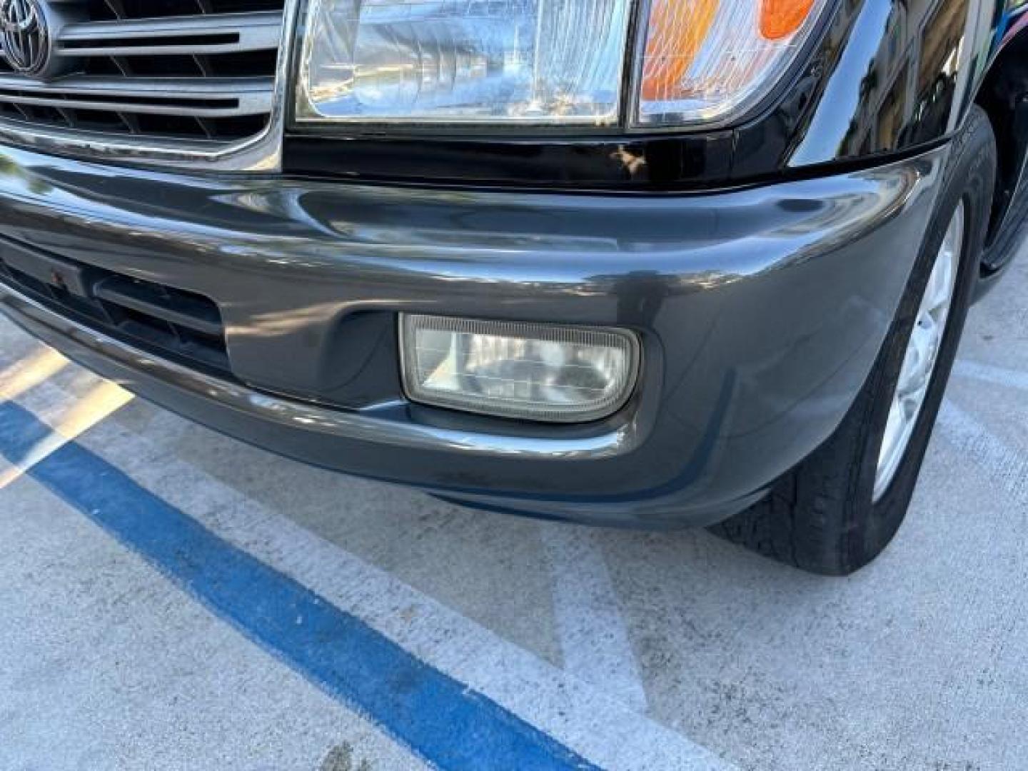 2003 Black Garnet Pearl /Stone Toyota Land Cruiser 4X4 18 SERVICE RECORDS NEW TIMING (JTEHT05JX32) with an 4.7L DOHC EFI 32-Valve V8 Engine engine, Automatic transmission, located at 4701 North Dixie Hwy, Pompano Beach, FL, 33064, (954) 422-2889, 26.240938, -80.123474 - OUR WEBPAGE FLORIDACARS1.COM HAS OVER 100 PHOTOS AND FREE CARFAX LINK 2003 TOYOTA LAND CRUISER VIN: JTEHT05JX32048900 J T E H T 0 5 J X 3 2 0 4 8 9 0 0 4 DOOR WAGON/SPORT UTILITY 4.7L V8 F DOHC 32V GASOLINE ALL WHEEL DRIVE NEW TIMING 10/17/2019 124,356 Toyota of Deerfield Beach Deerfield Beach, Flor - Photo#31