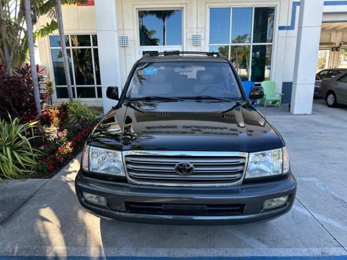 2003 Black Garnet Pearl /Stone Toyota Land Cruiser 4X4 18 SERVICE RECORDS NEW TIMING (JTEHT05JX32) with an 4.7L DOHC EFI 32-Valve V8 Engine engine, Automatic transmission, located at 4701 North Dixie Hwy, Pompano Beach, FL, 33064, (954) 422-2889, 26.240938, -80.123474 - OUR WEBPAGE FLORIDACARS1.COM HAS OVER 100 PHOTOS AND FREE CARFAX LINK 2003 TOYOTA LAND CRUISER VIN: JTEHT05JX32048900 J T E H T 0 5 J X 3 2 0 4 8 9 0 0 4 DOOR WAGON/SPORT UTILITY 4.7L V8 F DOHC 32V GASOLINE ALL WHEEL DRIVE NEW TIMING 10/17/2019 124,356 Toyota of Deerfield Beach Deerfield Beach, Flor - Photo#2