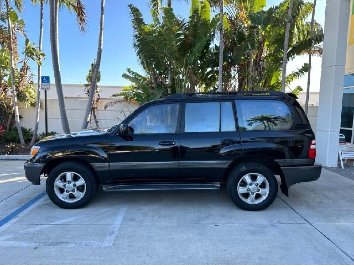 2003 Black Garnet Pearl /Stone Toyota Land Cruiser 4X4 18 SERVICE RECORDS NEW TIMING (JTEHT05JX32) with an 4.7L DOHC EFI 32-Valve V8 Engine engine, Automatic transmission, located at 4701 North Dixie Hwy, Pompano Beach, FL, 33064, (954) 422-2889, 26.240938, -80.123474 - OUR WEBPAGE FLORIDACARS1.COM HAS OVER 100 PHOTOS AND FREE CARFAX LINK 2003 TOYOTA LAND CRUISER VIN: JTEHT05JX32048900 J T E H T 0 5 J X 3 2 0 4 8 9 0 0 4 DOOR WAGON/SPORT UTILITY 4.7L V8 F DOHC 32V GASOLINE ALL WHEEL DRIVE NEW TIMING 10/17/2019 124,356 Toyota of Deerfield Beach Deerfield Beach, Flor - Photo#4
