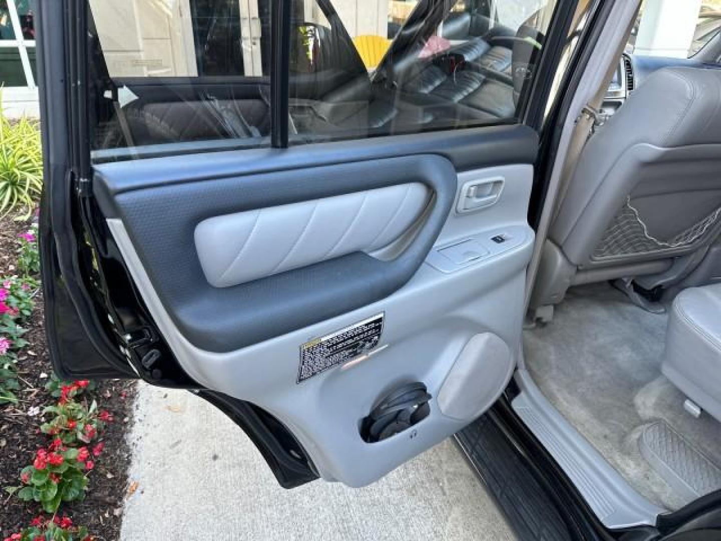 2003 Black Garnet Pearl /Stone Toyota Land Cruiser 4X4 18 SERVICE RECORDS NEW TIMING (JTEHT05JX32) with an 4.7L DOHC EFI 32-Valve V8 Engine engine, Automatic transmission, located at 4701 North Dixie Hwy, Pompano Beach, FL, 33064, (954) 422-2889, 26.240938, -80.123474 - OUR WEBPAGE FLORIDACARS1.COM HAS OVER 100 PHOTOS AND FREE CARFAX LINK 2003 TOYOTA LAND CRUISER VIN: JTEHT05JX32048900 J T E H T 0 5 J X 3 2 0 4 8 9 0 0 4 DOOR WAGON/SPORT UTILITY 4.7L V8 F DOHC 32V GASOLINE ALL WHEEL DRIVE NEW TIMING 10/17/2019 124,356 Toyota of Deerfield Beach Deerfield Beach, Flor - Photo#70