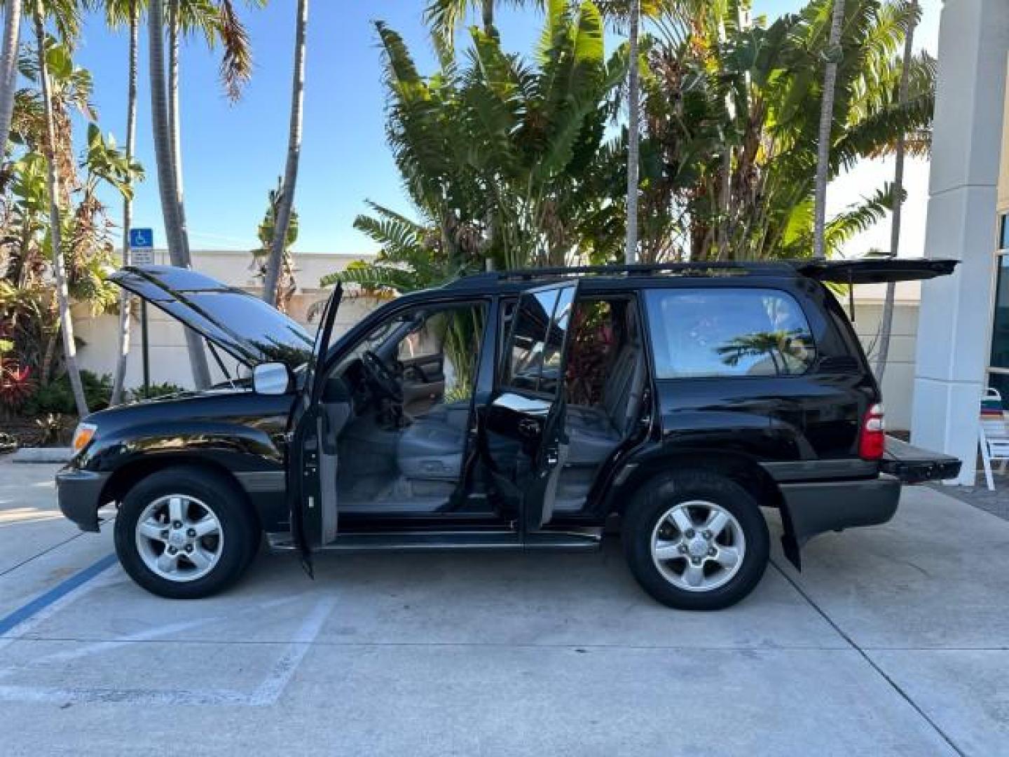 2003 Black Garnet Pearl /Stone Toyota Land Cruiser 4X4 18 SERVICE RECORDS NEW TIMING (JTEHT05JX32) with an 4.7L DOHC EFI 32-Valve V8 Engine engine, Automatic transmission, located at 4701 North Dixie Hwy, Pompano Beach, FL, 33064, (954) 422-2889, 26.240938, -80.123474 - OUR WEBPAGE FLORIDACARS1.COM HAS OVER 100 PHOTOS AND FREE CARFAX LINK 2003 TOYOTA LAND CRUISER VIN: JTEHT05JX32048900 J T E H T 0 5 J X 3 2 0 4 8 9 0 0 4 DOOR WAGON/SPORT UTILITY 4.7L V8 F DOHC 32V GASOLINE ALL WHEEL DRIVE NEW TIMING 10/17/2019 124,356 Toyota of Deerfield Beach Deerfield Beach, Flor - Photo#8
