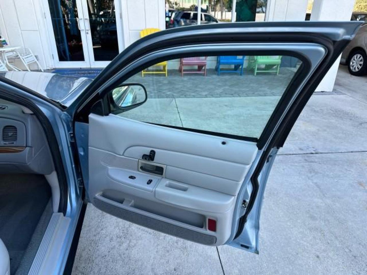 2003 Light Blue Metallic /Medium Parchment Ford Crown Victoria LX LOW MILES 31,713 (2FAFP74W53X) with an 4.6L SEFI OHC V8 Engine engine, Automatic transmission, located at 4701 North Dixie Hwy, Pompano Beach, FL, 33064, (954) 422-2889, 26.240938, -80.123474 - OUR WEBPAGE FLORIDACARS1.COM HAS OVER 100 PHOTOS AND FREE CARFAX LINK 2003 FORD CROWN VICTORIA LX VIN: 2FAFP74W53X100538 2 F A F P 7 4 W 5 3 X 1 0 0 5 3 8 SEDAN 4 DR 4.6L V8 F GASOLINE REAR WHEEL DRIVE Basic Features ABS Brakes CD Audio Power Mirrors Traction Control AM/FM Stereo Cassette Player Pow - Photo#11