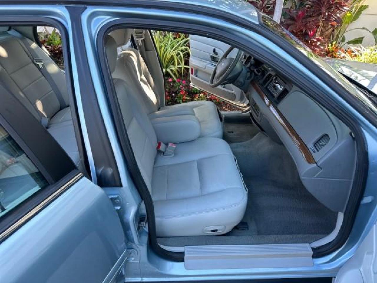 2003 Light Blue Metallic /Medium Parchment Ford Crown Victoria LX LOW MILES 31,713 (2FAFP74W53X) with an 4.6L SEFI OHC V8 Engine engine, Automatic transmission, located at 4701 North Dixie Hwy, Pompano Beach, FL, 33064, (954) 422-2889, 26.240938, -80.123474 - OUR WEBPAGE FLORIDACARS1.COM HAS OVER 100 PHOTOS AND FREE CARFAX LINK 2003 FORD CROWN VICTORIA LX VIN: 2FAFP74W53X100538 2 F A F P 7 4 W 5 3 X 1 0 0 5 3 8 SEDAN 4 DR 4.6L V8 F GASOLINE REAR WHEEL DRIVE Basic Features ABS Brakes CD Audio Power Mirrors Traction Control AM/FM Stereo Cassette Player Pow - Photo#12
