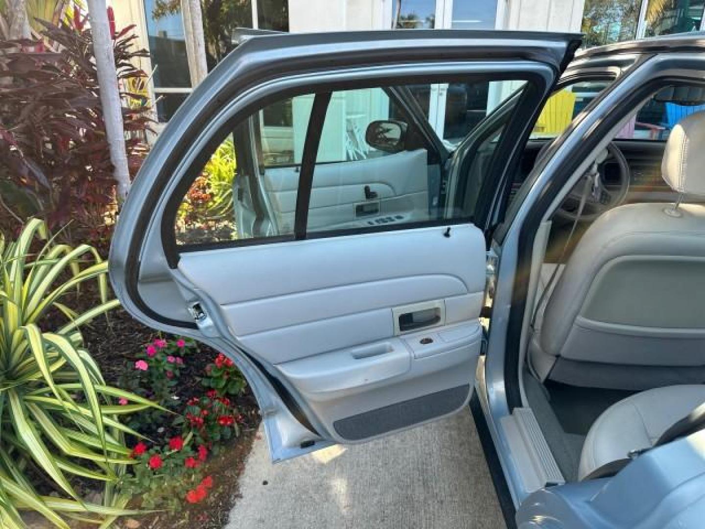 2003 Light Blue Metallic /Medium Parchment Ford Crown Victoria LX LOW MILES 31,713 (2FAFP74W53X) with an 4.6L SEFI OHC V8 Engine engine, Automatic transmission, located at 4701 North Dixie Hwy, Pompano Beach, FL, 33064, (954) 422-2889, 26.240938, -80.123474 - OUR WEBPAGE FLORIDACARS1.COM HAS OVER 100 PHOTOS AND FREE CARFAX LINK 2003 FORD CROWN VICTORIA LX VIN: 2FAFP74W53X100538 2 F A F P 7 4 W 5 3 X 1 0 0 5 3 8 SEDAN 4 DR 4.6L V8 F GASOLINE REAR WHEEL DRIVE Basic Features ABS Brakes CD Audio Power Mirrors Traction Control AM/FM Stereo Cassette Player Pow - Photo#13