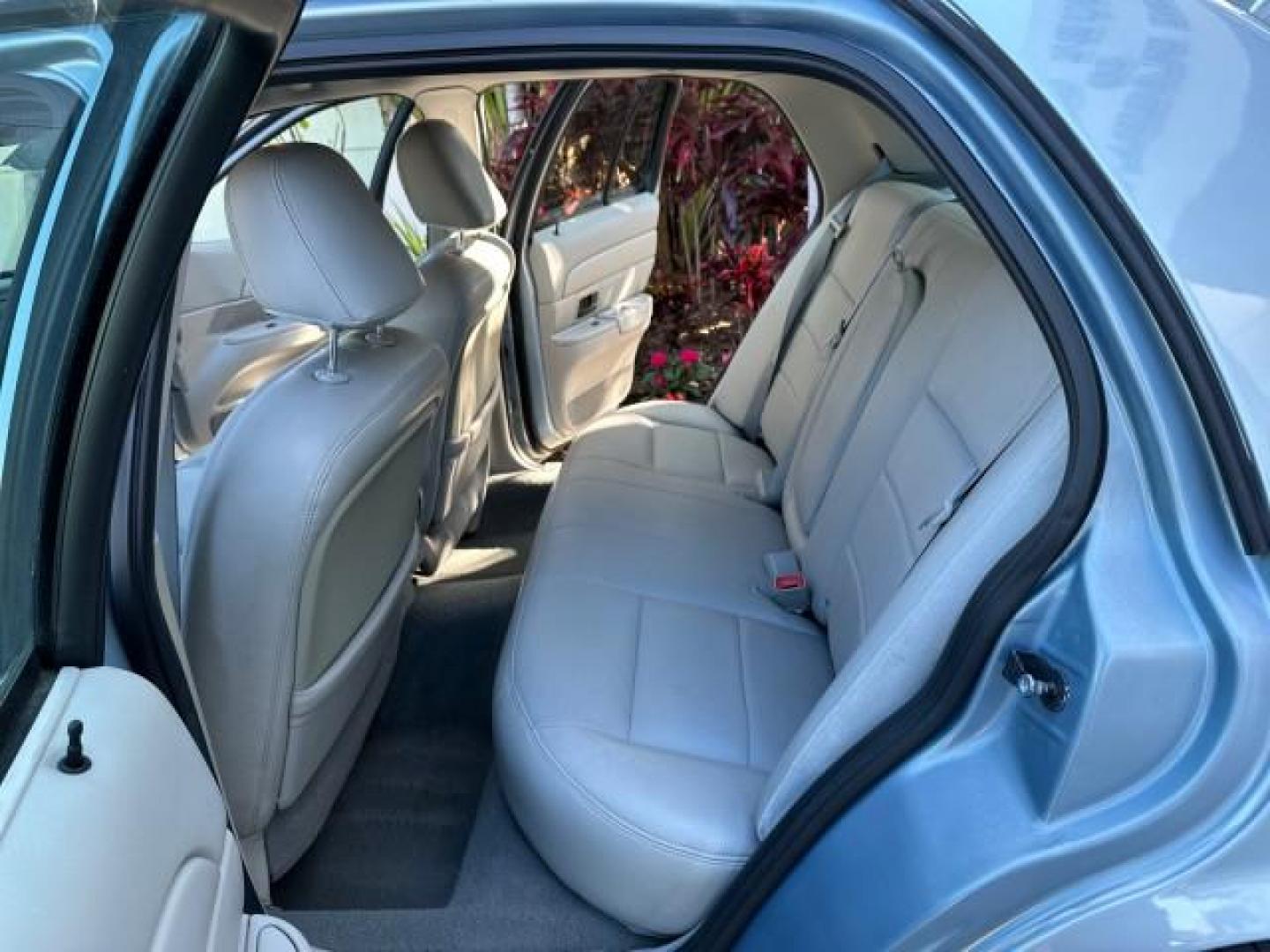 2003 Light Blue Metallic /Medium Parchment Ford Crown Victoria LX LOW MILES 31,713 (2FAFP74W53X) with an 4.6L SEFI OHC V8 Engine engine, Automatic transmission, located at 4701 North Dixie Hwy, Pompano Beach, FL, 33064, (954) 422-2889, 26.240938, -80.123474 - OUR WEBPAGE FLORIDACARS1.COM HAS OVER 100 PHOTOS AND FREE CARFAX LINK 2003 FORD CROWN VICTORIA LX VIN: 2FAFP74W53X100538 2 F A F P 7 4 W 5 3 X 1 0 0 5 3 8 SEDAN 4 DR 4.6L V8 F GASOLINE REAR WHEEL DRIVE Basic Features ABS Brakes CD Audio Power Mirrors Traction Control AM/FM Stereo Cassette Player Pow - Photo#14
