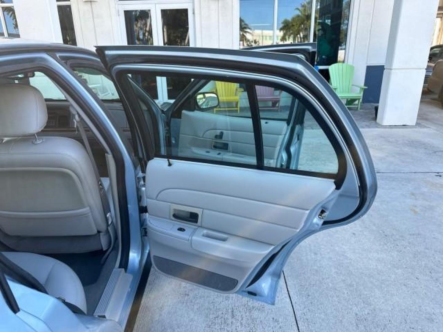 2003 Light Blue Metallic /Medium Parchment Ford Crown Victoria LX LOW MILES 31,713 (2FAFP74W53X) with an 4.6L SEFI OHC V8 Engine engine, Automatic transmission, located at 4701 North Dixie Hwy, Pompano Beach, FL, 33064, (954) 422-2889, 26.240938, -80.123474 - OUR WEBPAGE FLORIDACARS1.COM HAS OVER 100 PHOTOS AND FREE CARFAX LINK 2003 FORD CROWN VICTORIA LX VIN: 2FAFP74W53X100538 2 F A F P 7 4 W 5 3 X 1 0 0 5 3 8 SEDAN 4 DR 4.6L V8 F GASOLINE REAR WHEEL DRIVE Basic Features ABS Brakes CD Audio Power Mirrors Traction Control AM/FM Stereo Cassette Player Pow - Photo#15