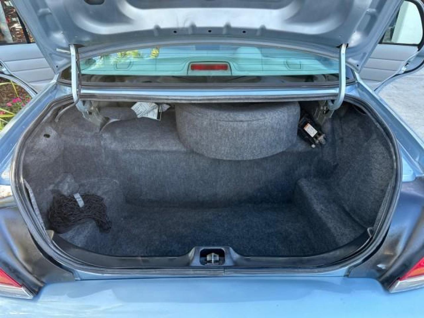 2003 Light Blue Metallic /Medium Parchment Ford Crown Victoria LX LOW MILES 31,713 (2FAFP74W53X) with an 4.6L SEFI OHC V8 Engine engine, Automatic transmission, located at 4701 North Dixie Hwy, Pompano Beach, FL, 33064, (954) 422-2889, 26.240938, -80.123474 - OUR WEBPAGE FLORIDACARS1.COM HAS OVER 100 PHOTOS AND FREE CARFAX LINK 2003 FORD CROWN VICTORIA LX VIN: 2FAFP74W53X100538 2 F A F P 7 4 W 5 3 X 1 0 0 5 3 8 SEDAN 4 DR 4.6L V8 F GASOLINE REAR WHEEL DRIVE Basic Features ABS Brakes CD Audio Power Mirrors Traction Control AM/FM Stereo Cassette Player Pow - Photo#17