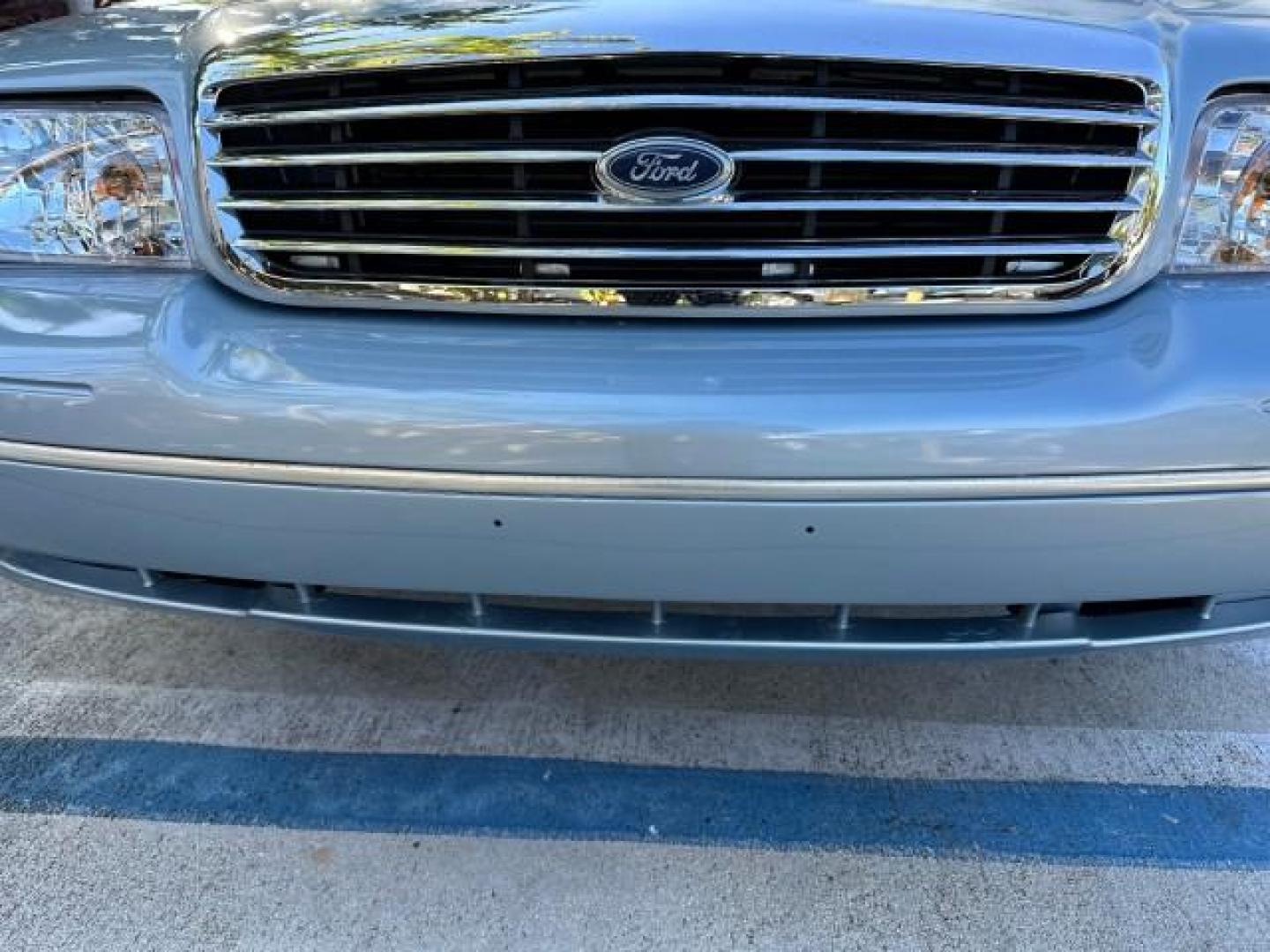 2003 Light Blue Metallic /Medium Parchment Ford Crown Victoria LX LOW MILES 31,713 (2FAFP74W53X) with an 4.6L SEFI OHC V8 Engine engine, Automatic transmission, located at 4701 North Dixie Hwy, Pompano Beach, FL, 33064, (954) 422-2889, 26.240938, -80.123474 - OUR WEBPAGE FLORIDACARS1.COM HAS OVER 100 PHOTOS AND FREE CARFAX LINK 2003 FORD CROWN VICTORIA LX VIN: 2FAFP74W53X100538 2 F A F P 7 4 W 5 3 X 1 0 0 5 3 8 SEDAN 4 DR 4.6L V8 F GASOLINE REAR WHEEL DRIVE Basic Features ABS Brakes CD Audio Power Mirrors Traction Control AM/FM Stereo Cassette Player Pow - Photo#26