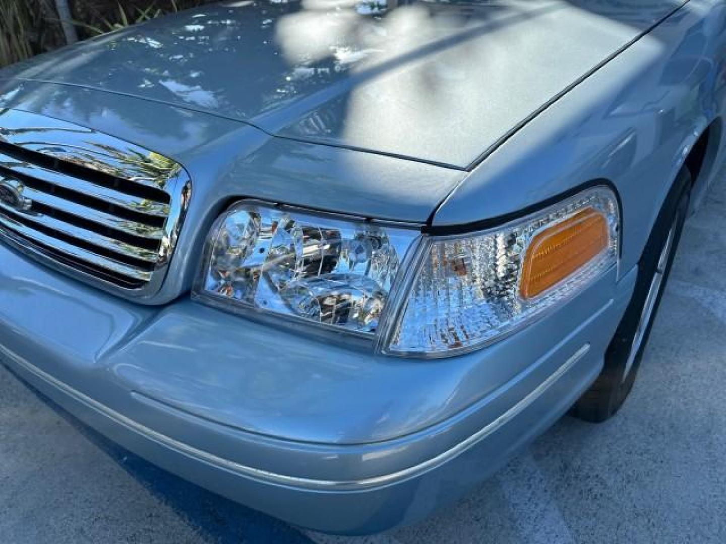 2003 Light Blue Metallic /Medium Parchment Ford Crown Victoria LX LOW MILES 31,713 (2FAFP74W53X) with an 4.6L SEFI OHC V8 Engine engine, Automatic transmission, located at 4701 North Dixie Hwy, Pompano Beach, FL, 33064, (954) 422-2889, 26.240938, -80.123474 - OUR WEBPAGE FLORIDACARS1.COM HAS OVER 100 PHOTOS AND FREE CARFAX LINK 2003 FORD CROWN VICTORIA LX VIN: 2FAFP74W53X100538 2 F A F P 7 4 W 5 3 X 1 0 0 5 3 8 SEDAN 4 DR 4.6L V8 F GASOLINE REAR WHEEL DRIVE Basic Features ABS Brakes CD Audio Power Mirrors Traction Control AM/FM Stereo Cassette Player Pow - Photo#27