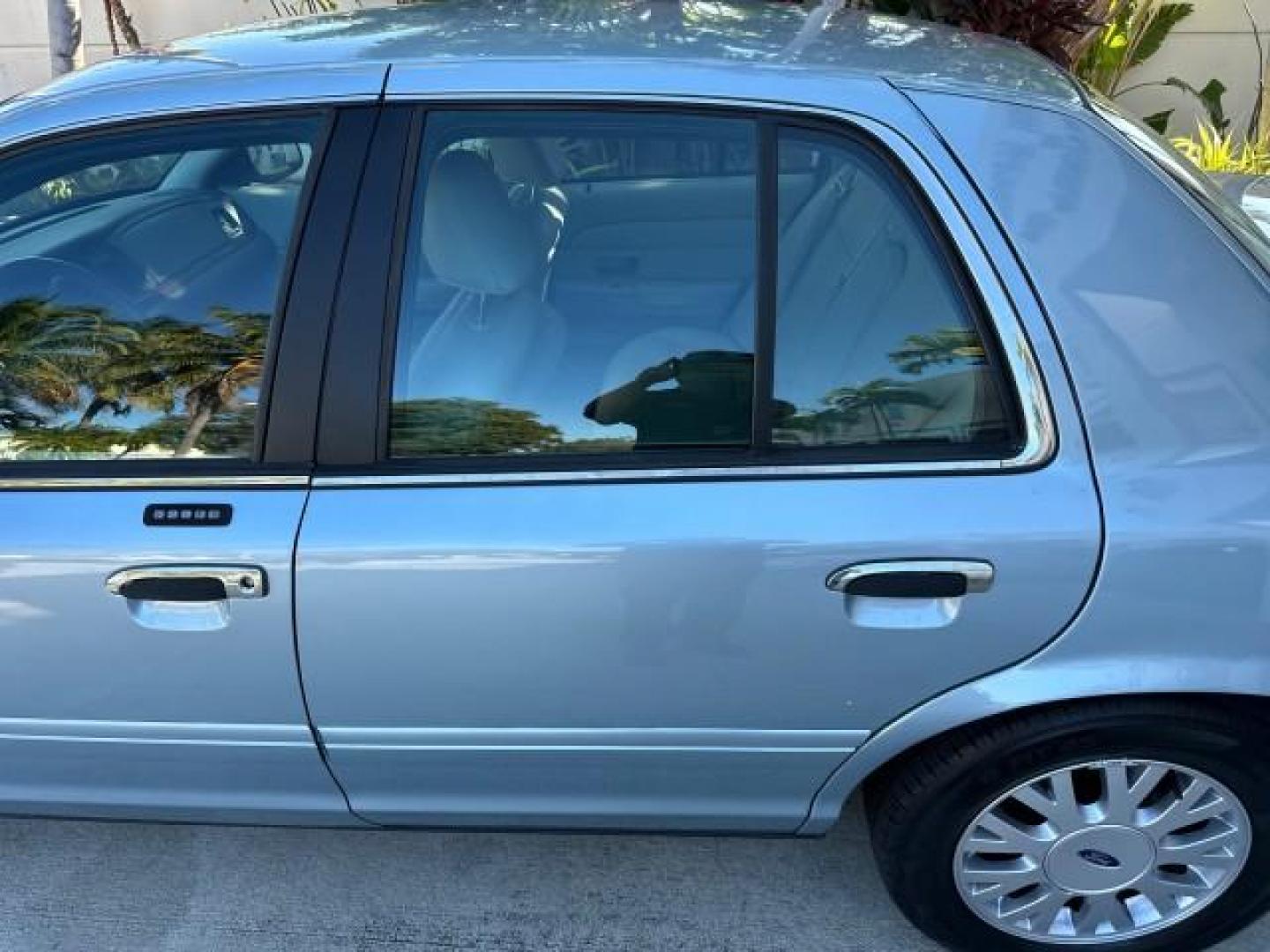 2003 Light Blue Metallic /Medium Parchment Ford Crown Victoria LX LOW MILES 31,713 (2FAFP74W53X) with an 4.6L SEFI OHC V8 Engine engine, Automatic transmission, located at 4701 North Dixie Hwy, Pompano Beach, FL, 33064, (954) 422-2889, 26.240938, -80.123474 - OUR WEBPAGE FLORIDACARS1.COM HAS OVER 100 PHOTOS AND FREE CARFAX LINK 2003 FORD CROWN VICTORIA LX VIN: 2FAFP74W53X100538 2 F A F P 7 4 W 5 3 X 1 0 0 5 3 8 SEDAN 4 DR 4.6L V8 F GASOLINE REAR WHEEL DRIVE Basic Features ABS Brakes CD Audio Power Mirrors Traction Control AM/FM Stereo Cassette Player Pow - Photo#33