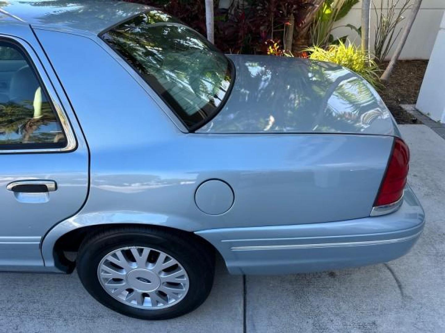 2003 Light Blue Metallic /Medium Parchment Ford Crown Victoria LX LOW MILES 31,713 (2FAFP74W53X) with an 4.6L SEFI OHC V8 Engine engine, Automatic transmission, located at 4701 North Dixie Hwy, Pompano Beach, FL, 33064, (954) 422-2889, 26.240938, -80.123474 - OUR WEBPAGE FLORIDACARS1.COM HAS OVER 100 PHOTOS AND FREE CARFAX LINK 2003 FORD CROWN VICTORIA LX VIN: 2FAFP74W53X100538 2 F A F P 7 4 W 5 3 X 1 0 0 5 3 8 SEDAN 4 DR 4.6L V8 F GASOLINE REAR WHEEL DRIVE Basic Features ABS Brakes CD Audio Power Mirrors Traction Control AM/FM Stereo Cassette Player Pow - Photo#34