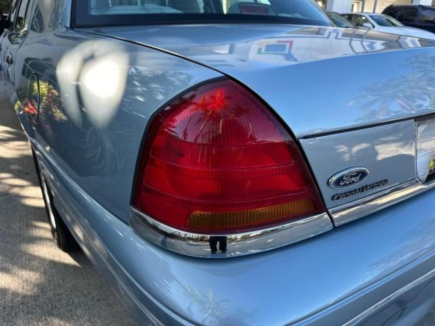 2003 Light Blue Metallic /Medium Parchment Ford Crown Victoria LX LOW MILES 31,713 (2FAFP74W53X) with an 4.6L SEFI OHC V8 Engine engine, Automatic transmission, located at 4701 North Dixie Hwy, Pompano Beach, FL, 33064, (954) 422-2889, 26.240938, -80.123474 - OUR WEBPAGE FLORIDACARS1.COM HAS OVER 100 PHOTOS AND FREE CARFAX LINK 2003 FORD CROWN VICTORIA LX VIN: 2FAFP74W53X100538 2 F A F P 7 4 W 5 3 X 1 0 0 5 3 8 SEDAN 4 DR 4.6L V8 F GASOLINE REAR WHEEL DRIVE Basic Features ABS Brakes CD Audio Power Mirrors Traction Control AM/FM Stereo Cassette Player Pow - Photo#48