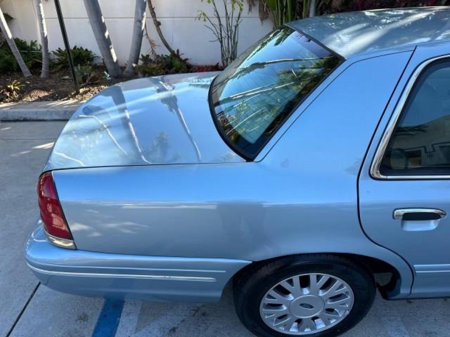 2003 Light Blue Metallic /Medium Parchment Ford Crown Victoria LX LOW MILES 31,713 (2FAFP74W53X) with an 4.6L SEFI OHC V8 Engine engine, Automatic transmission, located at 4701 North Dixie Hwy, Pompano Beach, FL, 33064, (954) 422-2889, 26.240938, -80.123474 - OUR WEBPAGE FLORIDACARS1.COM HAS OVER 100 PHOTOS AND FREE CARFAX LINK 2003 FORD CROWN VICTORIA LX VIN: 2FAFP74W53X100538 2 F A F P 7 4 W 5 3 X 1 0 0 5 3 8 SEDAN 4 DR 4.6L V8 F GASOLINE REAR WHEEL DRIVE Basic Features ABS Brakes CD Audio Power Mirrors Traction Control AM/FM Stereo Cassette Player Pow - Photo#52
