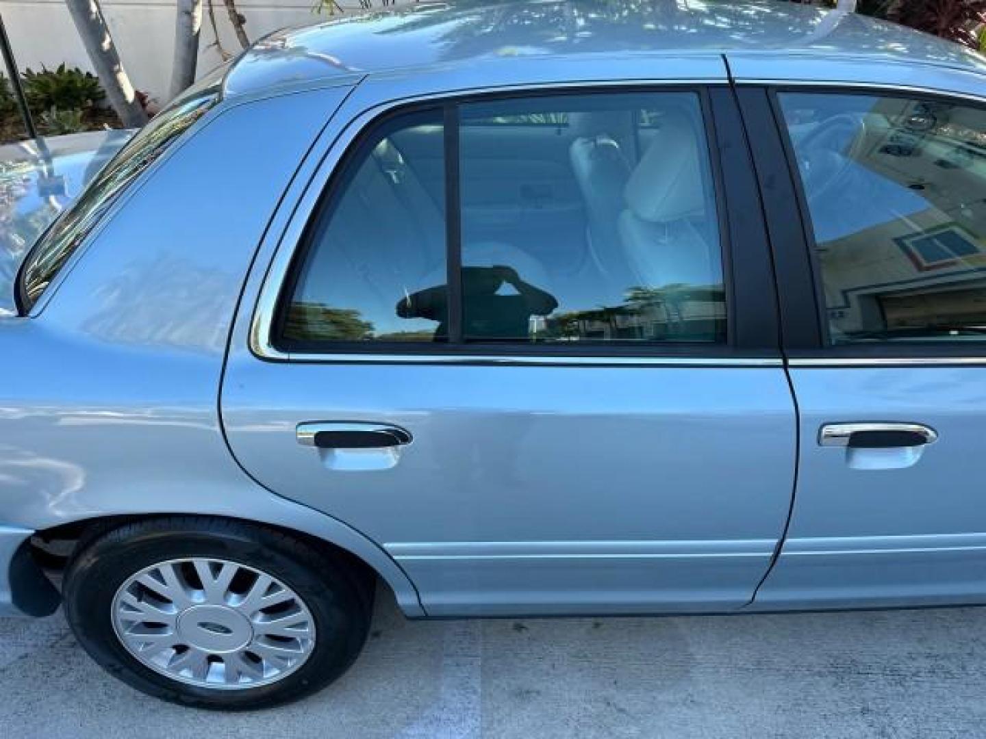 2003 Light Blue Metallic /Medium Parchment Ford Crown Victoria LX LOW MILES 31,713 (2FAFP74W53X) with an 4.6L SEFI OHC V8 Engine engine, Automatic transmission, located at 4701 North Dixie Hwy, Pompano Beach, FL, 33064, (954) 422-2889, 26.240938, -80.123474 - OUR WEBPAGE FLORIDACARS1.COM HAS OVER 100 PHOTOS AND FREE CARFAX LINK 2003 FORD CROWN VICTORIA LX VIN: 2FAFP74W53X100538 2 F A F P 7 4 W 5 3 X 1 0 0 5 3 8 SEDAN 4 DR 4.6L V8 F GASOLINE REAR WHEEL DRIVE Basic Features ABS Brakes CD Audio Power Mirrors Traction Control AM/FM Stereo Cassette Player Pow - Photo#53