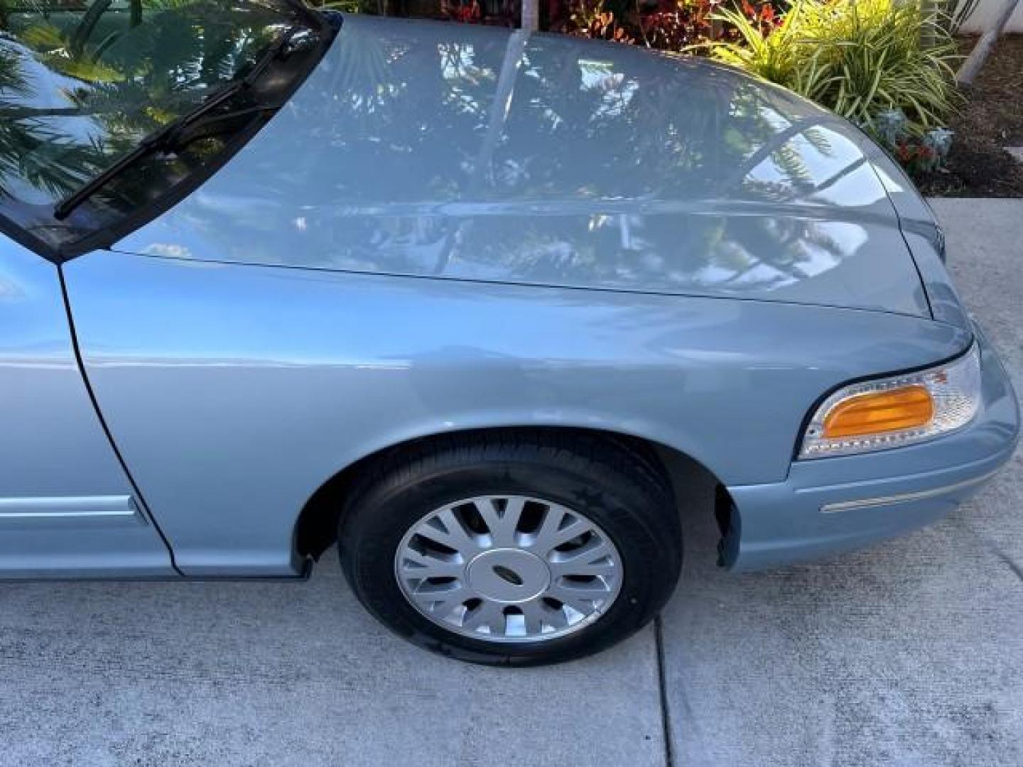 2003 Light Blue Metallic /Medium Parchment Ford Crown Victoria LX LOW MILES 31,713 (2FAFP74W53X) with an 4.6L SEFI OHC V8 Engine engine, Automatic transmission, located at 4701 North Dixie Hwy, Pompano Beach, FL, 33064, (954) 422-2889, 26.240938, -80.123474 - OUR WEBPAGE FLORIDACARS1.COM HAS OVER 100 PHOTOS AND FREE CARFAX LINK 2003 FORD CROWN VICTORIA LX VIN: 2FAFP74W53X100538 2 F A F P 7 4 W 5 3 X 1 0 0 5 3 8 SEDAN 4 DR 4.6L V8 F GASOLINE REAR WHEEL DRIVE Basic Features ABS Brakes CD Audio Power Mirrors Traction Control AM/FM Stereo Cassette Player Pow - Photo#55