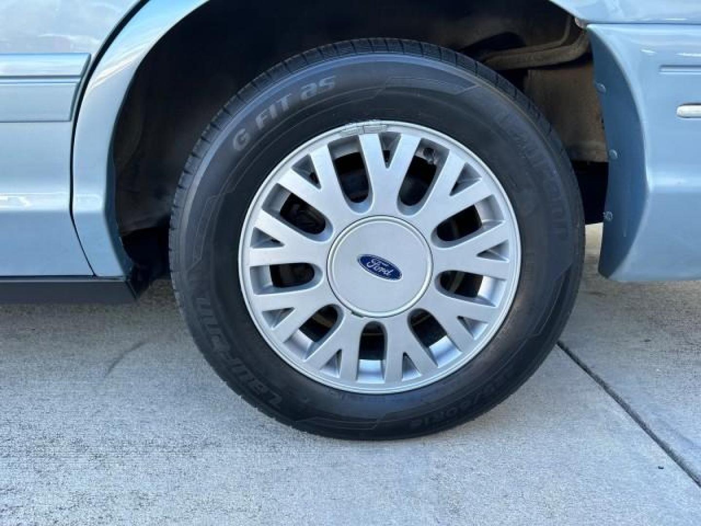 2003 Light Blue Metallic /Medium Parchment Ford Crown Victoria LX LOW MILES 31,713 (2FAFP74W53X) with an 4.6L SEFI OHC V8 Engine engine, Automatic transmission, located at 4701 North Dixie Hwy, Pompano Beach, FL, 33064, (954) 422-2889, 26.240938, -80.123474 - OUR WEBPAGE FLORIDACARS1.COM HAS OVER 100 PHOTOS AND FREE CARFAX LINK 2003 FORD CROWN VICTORIA LX VIN: 2FAFP74W53X100538 2 F A F P 7 4 W 5 3 X 1 0 0 5 3 8 SEDAN 4 DR 4.6L V8 F GASOLINE REAR WHEEL DRIVE Basic Features ABS Brakes CD Audio Power Mirrors Traction Control AM/FM Stereo Cassette Player Pow - Photo#61