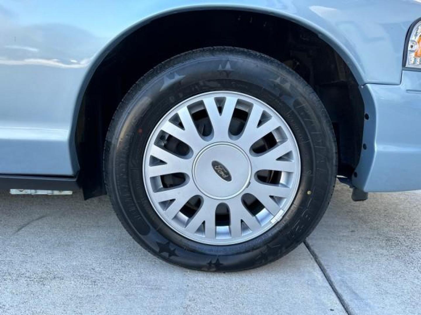 2003 Light Blue Metallic /Medium Parchment Ford Crown Victoria LX LOW MILES 31,713 (2FAFP74W53X) with an 4.6L SEFI OHC V8 Engine engine, Automatic transmission, located at 4701 North Dixie Hwy, Pompano Beach, FL, 33064, (954) 422-2889, 26.240938, -80.123474 - OUR WEBPAGE FLORIDACARS1.COM HAS OVER 100 PHOTOS AND FREE CARFAX LINK 2003 FORD CROWN VICTORIA LX VIN: 2FAFP74W53X100538 2 F A F P 7 4 W 5 3 X 1 0 0 5 3 8 SEDAN 4 DR 4.6L V8 F GASOLINE REAR WHEEL DRIVE Basic Features ABS Brakes CD Audio Power Mirrors Traction Control AM/FM Stereo Cassette Player Pow - Photo#63