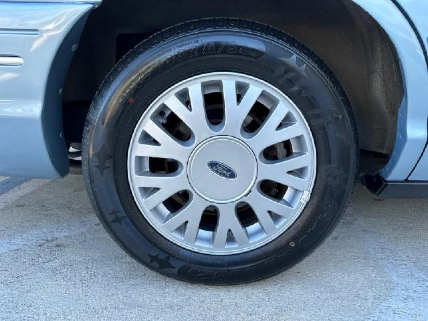 2003 Light Blue Metallic /Medium Parchment Ford Crown Victoria LX LOW MILES 31,713 (2FAFP74W53X) with an 4.6L SEFI OHC V8 Engine engine, Automatic transmission, located at 4701 North Dixie Hwy, Pompano Beach, FL, 33064, (954) 422-2889, 26.240938, -80.123474 - OUR WEBPAGE FLORIDACARS1.COM HAS OVER 100 PHOTOS AND FREE CARFAX LINK 2003 FORD CROWN VICTORIA LX VIN: 2FAFP74W53X100538 2 F A F P 7 4 W 5 3 X 1 0 0 5 3 8 SEDAN 4 DR 4.6L V8 F GASOLINE REAR WHEEL DRIVE Basic Features ABS Brakes CD Audio Power Mirrors Traction Control AM/FM Stereo Cassette Player Pow - Photo#65