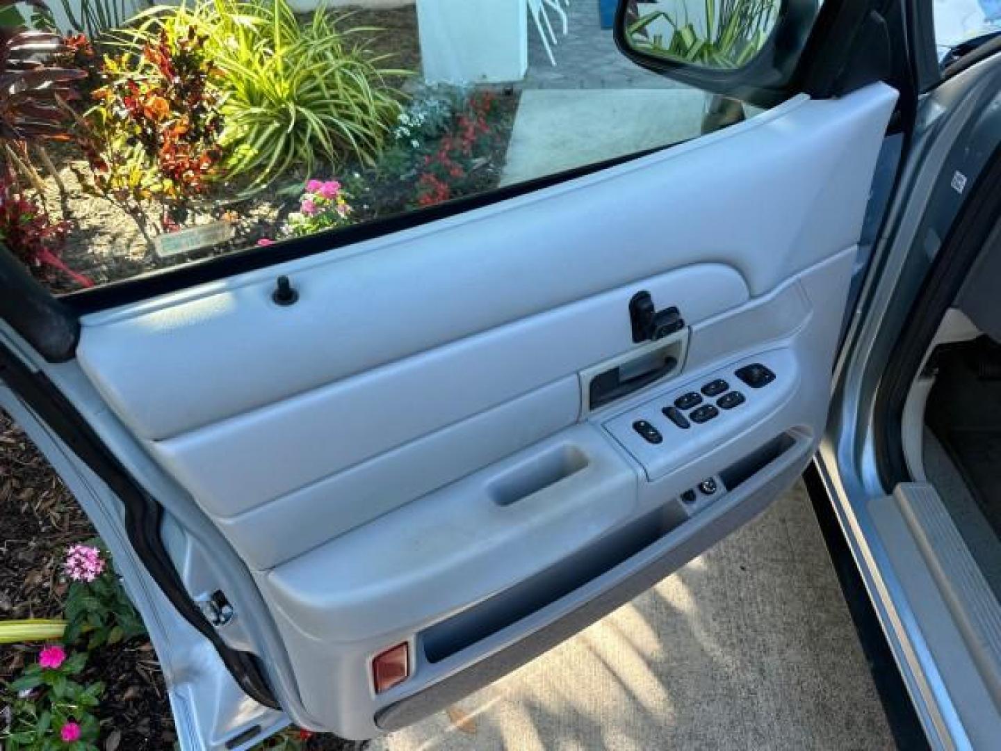 2003 Light Blue Metallic /Medium Parchment Ford Crown Victoria LX LOW MILES 31,713 (2FAFP74W53X) with an 4.6L SEFI OHC V8 Engine engine, Automatic transmission, located at 4701 North Dixie Hwy, Pompano Beach, FL, 33064, (954) 422-2889, 26.240938, -80.123474 - OUR WEBPAGE FLORIDACARS1.COM HAS OVER 100 PHOTOS AND FREE CARFAX LINK 2003 FORD CROWN VICTORIA LX VIN: 2FAFP74W53X100538 2 F A F P 7 4 W 5 3 X 1 0 0 5 3 8 SEDAN 4 DR 4.6L V8 F GASOLINE REAR WHEEL DRIVE Basic Features ABS Brakes CD Audio Power Mirrors Traction Control AM/FM Stereo Cassette Player Pow - Photo#70