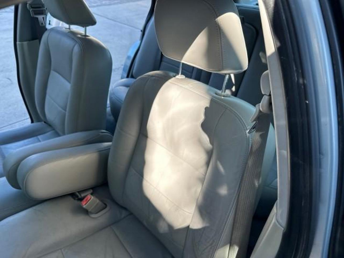 2003 Light Blue Metallic /Medium Parchment Ford Crown Victoria LX LOW MILES 31,713 (2FAFP74W53X) with an 4.6L SEFI OHC V8 Engine engine, Automatic transmission, located at 4701 North Dixie Hwy, Pompano Beach, FL, 33064, (954) 422-2889, 26.240938, -80.123474 - OUR WEBPAGE FLORIDACARS1.COM HAS OVER 100 PHOTOS AND FREE CARFAX LINK 2003 FORD CROWN VICTORIA LX VIN: 2FAFP74W53X100538 2 F A F P 7 4 W 5 3 X 1 0 0 5 3 8 SEDAN 4 DR 4.6L V8 F GASOLINE REAR WHEEL DRIVE Basic Features ABS Brakes CD Audio Power Mirrors Traction Control AM/FM Stereo Cassette Player Pow - Photo#71