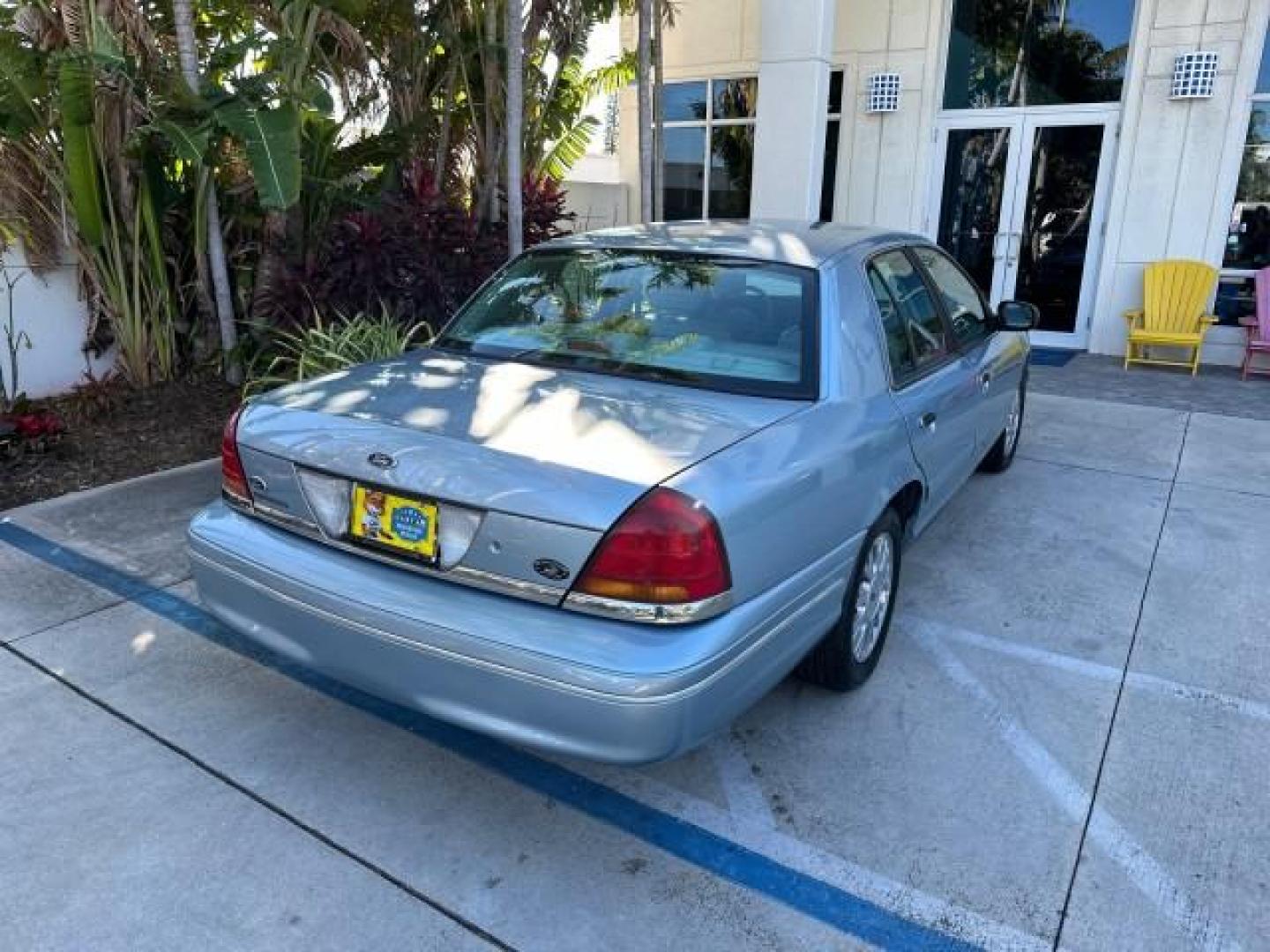 2003 Light Blue Metallic /Medium Parchment Ford Crown Victoria LX LOW MILES 31,713 (2FAFP74W53X) with an 4.6L SEFI OHC V8 Engine engine, Automatic transmission, located at 4701 North Dixie Hwy, Pompano Beach, FL, 33064, (954) 422-2889, 26.240938, -80.123474 - OUR WEBPAGE FLORIDACARS1.COM HAS OVER 100 PHOTOS AND FREE CARFAX LINK 2003 FORD CROWN VICTORIA LX VIN: 2FAFP74W53X100538 2 F A F P 7 4 W 5 3 X 1 0 0 5 3 8 SEDAN 4 DR 4.6L V8 F GASOLINE REAR WHEEL DRIVE Basic Features ABS Brakes CD Audio Power Mirrors Traction Control AM/FM Stereo Cassette Player Pow - Photo#7