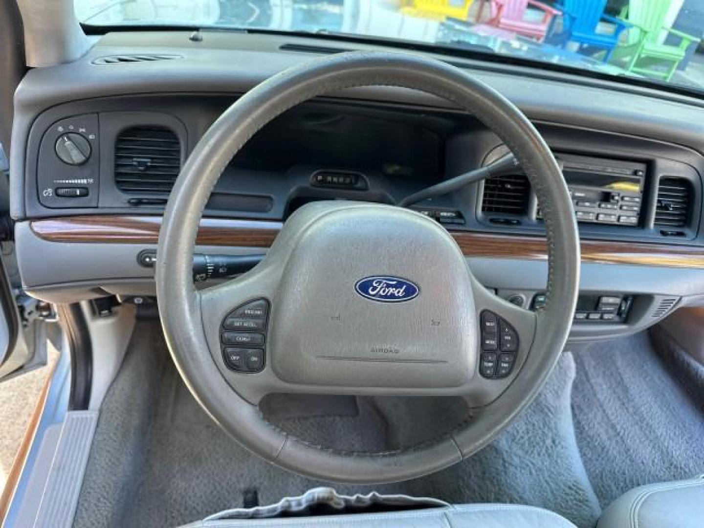 2003 Light Blue Metallic /Medium Parchment Ford Crown Victoria LX LOW MILES 31,713 (2FAFP74W53X) with an 4.6L SEFI OHC V8 Engine engine, Automatic transmission, located at 4701 North Dixie Hwy, Pompano Beach, FL, 33064, (954) 422-2889, 26.240938, -80.123474 - OUR WEBPAGE FLORIDACARS1.COM HAS OVER 100 PHOTOS AND FREE CARFAX LINK 2003 FORD CROWN VICTORIA LX VIN: 2FAFP74W53X100538 2 F A F P 7 4 W 5 3 X 1 0 0 5 3 8 SEDAN 4 DR 4.6L V8 F GASOLINE REAR WHEEL DRIVE Basic Features ABS Brakes CD Audio Power Mirrors Traction Control AM/FM Stereo Cassette Player Pow - Photo#81