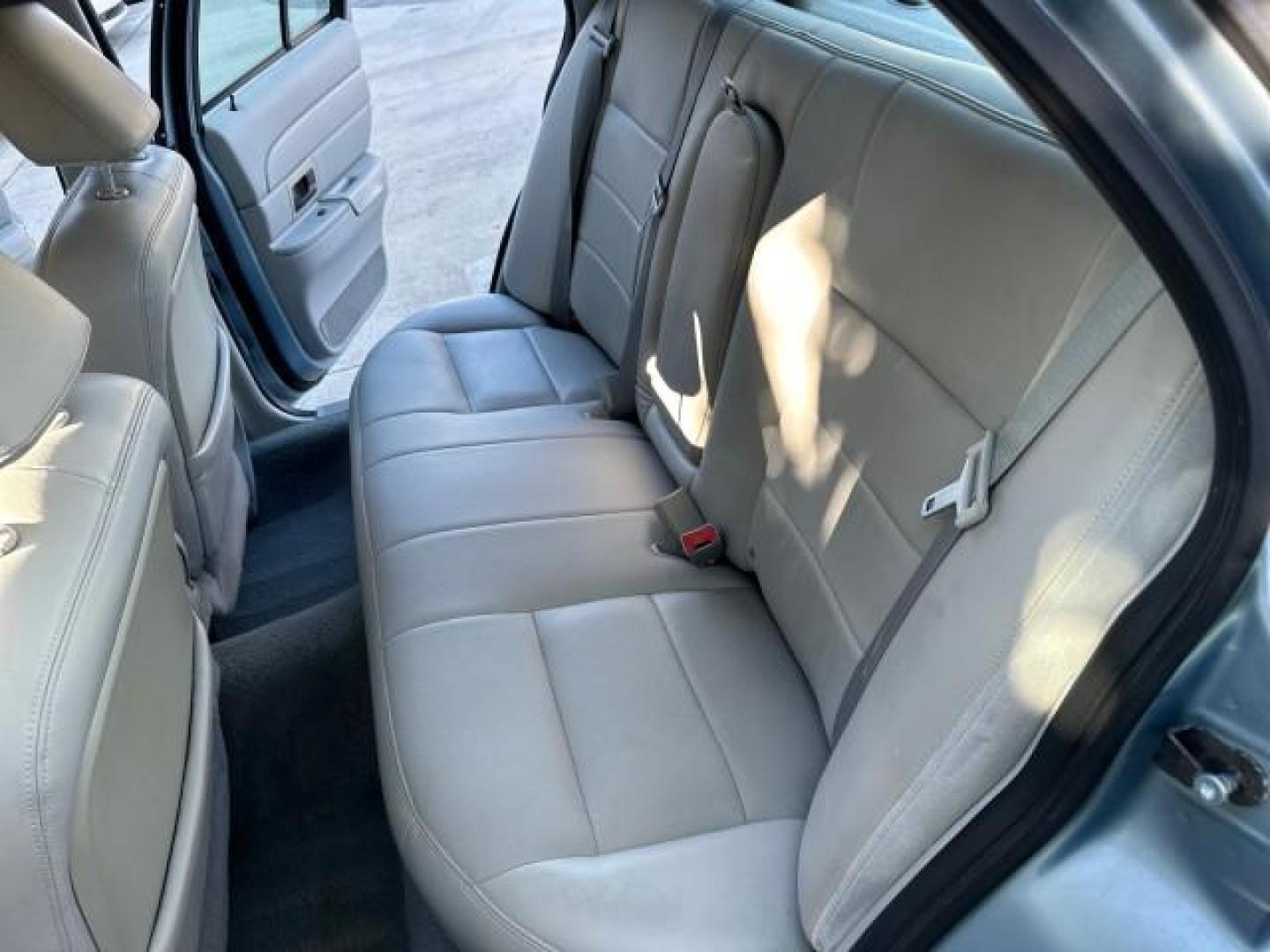 2003 Light Blue Metallic /Medium Parchment Ford Crown Victoria LX LOW MILES 31,713 (2FAFP74W53X) with an 4.6L SEFI OHC V8 Engine engine, Automatic transmission, located at 4701 North Dixie Hwy, Pompano Beach, FL, 33064, (954) 422-2889, 26.240938, -80.123474 - OUR WEBPAGE FLORIDACARS1.COM HAS OVER 100 PHOTOS AND FREE CARFAX LINK 2003 FORD CROWN VICTORIA LX VIN: 2FAFP74W53X100538 2 F A F P 7 4 W 5 3 X 1 0 0 5 3 8 SEDAN 4 DR 4.6L V8 F GASOLINE REAR WHEEL DRIVE Basic Features ABS Brakes CD Audio Power Mirrors Traction Control AM/FM Stereo Cassette Player Pow - Photo#97