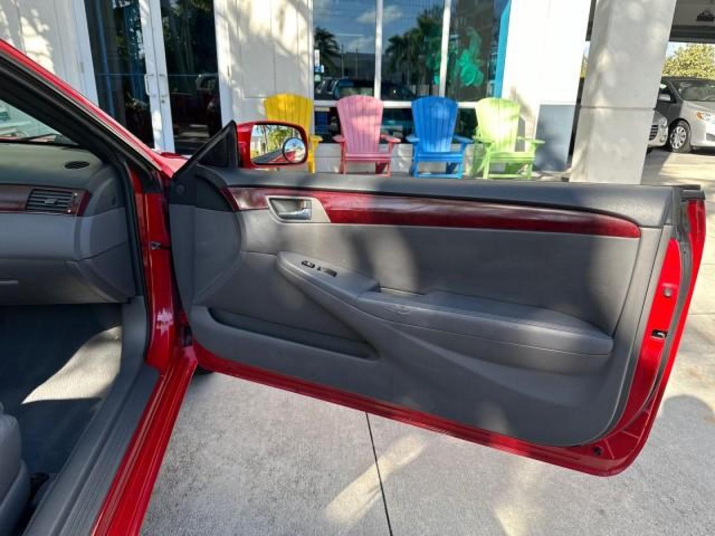 2004 Absolutely Red /Dark Stone Toyota Camry Solara 1 FL SLE LOW MILES 17,713 (4T1FA38P74U) with an 3.3L DOHC SMPI VVT-i 24-Valve V6 Engine engine, Automatic transmission, located at 4701 North Dixie Hwy, Pompano Beach, FL, 33064, (954) 422-2889, 26.240938, -80.123474 - OUR WEBPAGE FLORIDACARS1.COM HAS OVER 100 PHOTOS AND FREE CARFAX LINK 2004 TOYOTA CAMRY SOLARA SLE V6 VIN: 4T1FA38P74U024669 4 T 1 F A 3 8 P 7 4 U 0 2 4 6 6 9 CONVERTIBLE 3.3L V6 F DOHC 24V 29 MPG GASOLINE FRONT WHEEL DRIVE Top Features Alloy Wheels Leather Seats Front Seat Heaters Satellite Radio R - Photo#12