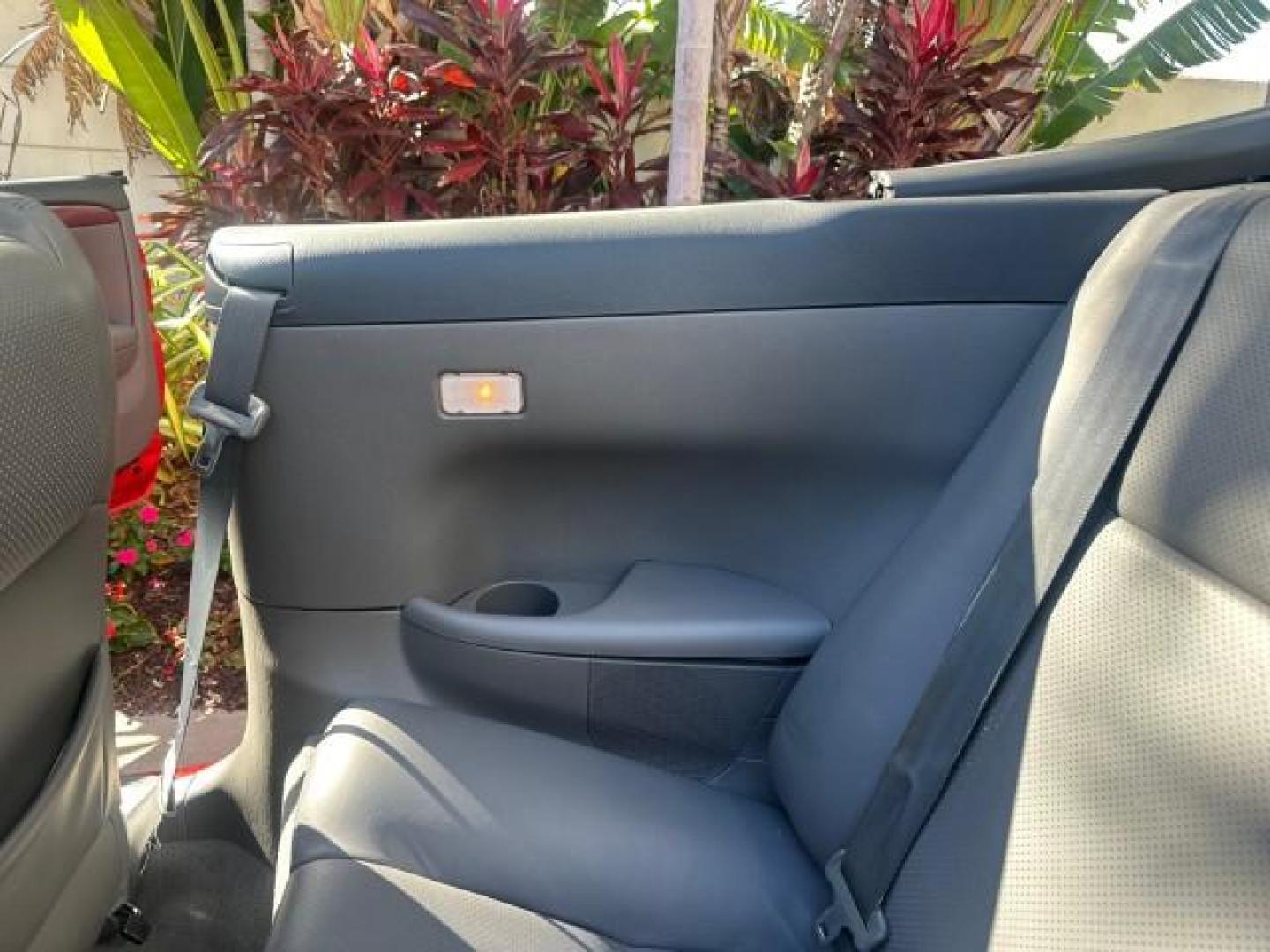 2004 Absolutely Red /Dark Stone Toyota Camry Solara 1 FL SLE LOW MILES 17,713 (4T1FA38P74U) with an 3.3L DOHC SMPI VVT-i 24-Valve V6 Engine engine, Automatic transmission, located at 4701 North Dixie Hwy, Pompano Beach, FL, 33064, (954) 422-2889, 26.240938, -80.123474 - OUR WEBPAGE FLORIDACARS1.COM HAS OVER 100 PHOTOS AND FREE CARFAX LINK 2004 TOYOTA CAMRY SOLARA SLE V6 VIN: 4T1FA38P74U024669 4 T 1 F A 3 8 P 7 4 U 0 2 4 6 6 9 CONVERTIBLE 3.3L V6 F DOHC 24V 29 MPG GASOLINE FRONT WHEEL DRIVE Top Features Alloy Wheels Leather Seats Front Seat Heaters Satellite Radio R - Photo#14