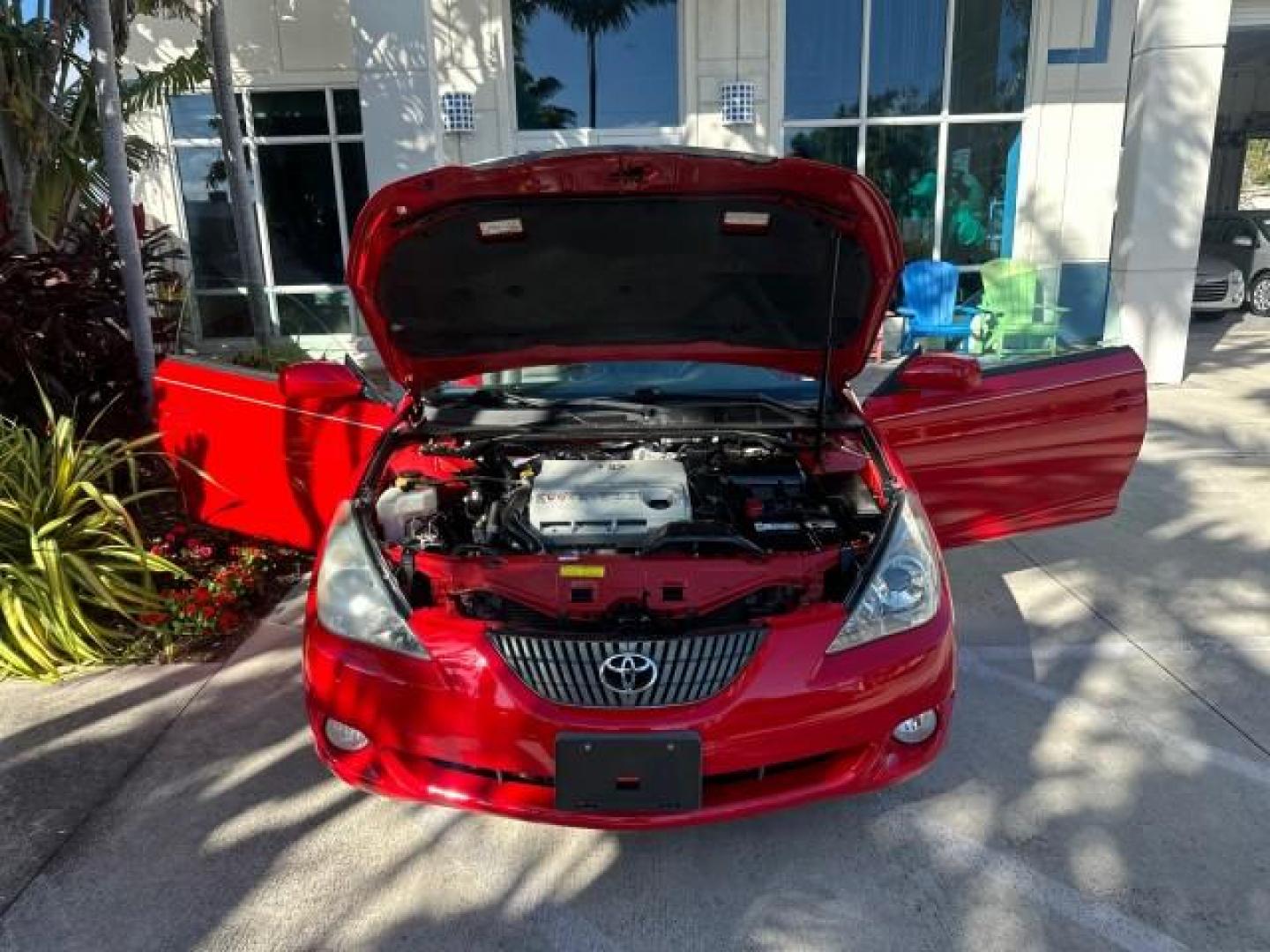 2004 Absolutely Red /Dark Stone Toyota Camry Solara 1 FL SLE LOW MILES 17,713 (4T1FA38P74U) with an 3.3L DOHC SMPI VVT-i 24-Valve V6 Engine engine, Automatic transmission, located at 4701 North Dixie Hwy, Pompano Beach, FL, 33064, (954) 422-2889, 26.240938, -80.123474 - OUR WEBPAGE FLORIDACARS1.COM HAS OVER 100 PHOTOS AND FREE CARFAX LINK 2004 TOYOTA CAMRY SOLARA SLE V6 VIN: 4T1FA38P74U024669 4 T 1 F A 3 8 P 7 4 U 0 2 4 6 6 9 CONVERTIBLE 3.3L V6 F DOHC 24V 29 MPG GASOLINE FRONT WHEEL DRIVE Top Features Alloy Wheels Leather Seats Front Seat Heaters Satellite Radio R - Photo#20