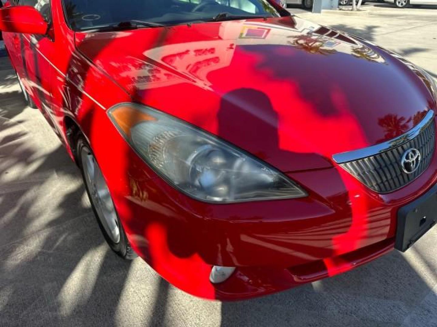 2004 Absolutely Red /Dark Stone Toyota Camry Solara 1 FL SLE LOW MILES 17,713 (4T1FA38P74U) with an 3.3L DOHC SMPI VVT-i 24-Valve V6 Engine engine, Automatic transmission, located at 4701 North Dixie Hwy, Pompano Beach, FL, 33064, (954) 422-2889, 26.240938, -80.123474 - OUR WEBPAGE FLORIDACARS1.COM HAS OVER 100 PHOTOS AND FREE CARFAX LINK 2004 TOYOTA CAMRY SOLARA SLE V6 VIN: 4T1FA38P74U024669 4 T 1 F A 3 8 P 7 4 U 0 2 4 6 6 9 CONVERTIBLE 3.3L V6 F DOHC 24V 29 MPG GASOLINE FRONT WHEEL DRIVE Top Features Alloy Wheels Leather Seats Front Seat Heaters Satellite Radio R - Photo#24