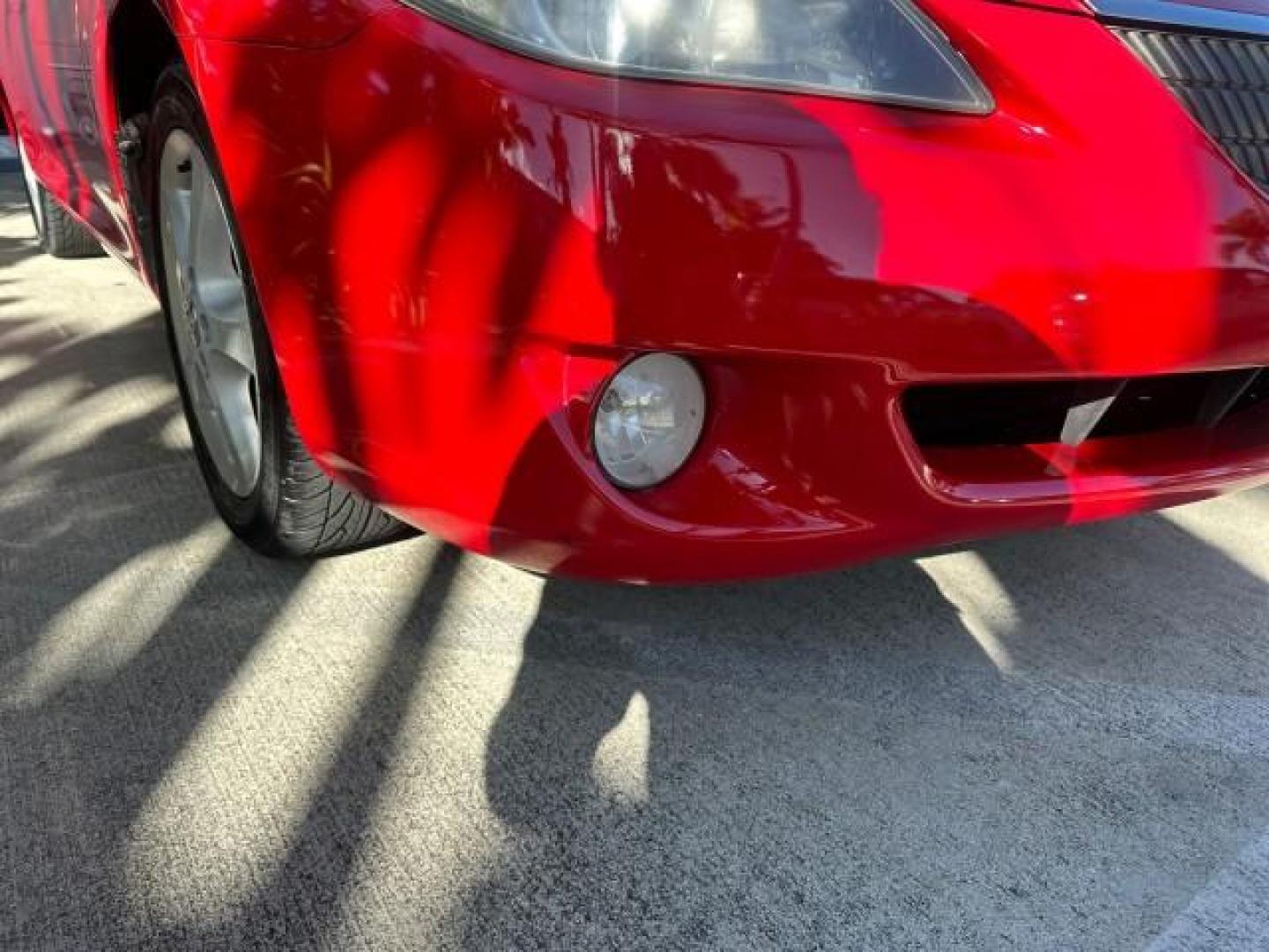 2004 Absolutely Red /Dark Stone Toyota Camry Solara 1 FL SLE LOW MILES 17,713 (4T1FA38P74U) with an 3.3L DOHC SMPI VVT-i 24-Valve V6 Engine engine, Automatic transmission, located at 4701 North Dixie Hwy, Pompano Beach, FL, 33064, (954) 422-2889, 26.240938, -80.123474 - OUR WEBPAGE FLORIDACARS1.COM HAS OVER 100 PHOTOS AND FREE CARFAX LINK 2004 TOYOTA CAMRY SOLARA SLE V6 VIN: 4T1FA38P74U024669 4 T 1 F A 3 8 P 7 4 U 0 2 4 6 6 9 CONVERTIBLE 3.3L V6 F DOHC 24V 29 MPG GASOLINE FRONT WHEEL DRIVE Top Features Alloy Wheels Leather Seats Front Seat Heaters Satellite Radio R - Photo#25