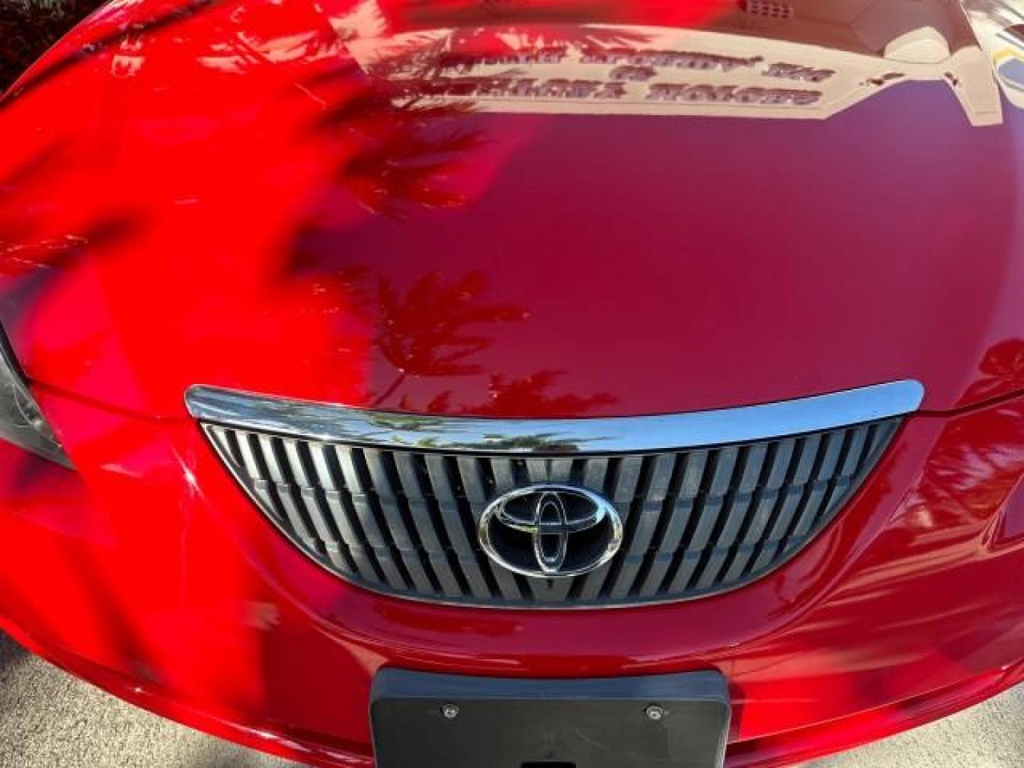 2004 Absolutely Red /Dark Stone Toyota Camry Solara 1 FL SLE LOW MILES 17,713 (4T1FA38P74U) with an 3.3L DOHC SMPI VVT-i 24-Valve V6 Engine engine, Automatic transmission, located at 4701 North Dixie Hwy, Pompano Beach, FL, 33064, (954) 422-2889, 26.240938, -80.123474 - OUR WEBPAGE FLORIDACARS1.COM HAS OVER 100 PHOTOS AND FREE CARFAX LINK 2004 TOYOTA CAMRY SOLARA SLE V6 VIN: 4T1FA38P74U024669 4 T 1 F A 3 8 P 7 4 U 0 2 4 6 6 9 CONVERTIBLE 3.3L V6 F DOHC 24V 29 MPG GASOLINE FRONT WHEEL DRIVE Top Features Alloy Wheels Leather Seats Front Seat Heaters Satellite Radio R - Photo#26