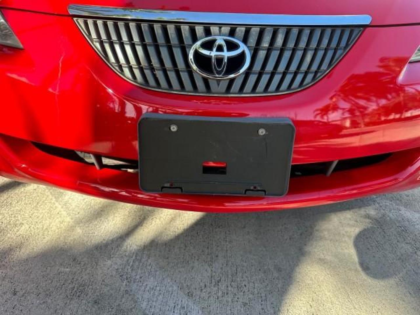 2004 Absolutely Red /Dark Stone Toyota Camry Solara 1 FL SLE LOW MILES 17,713 (4T1FA38P74U) with an 3.3L DOHC SMPI VVT-i 24-Valve V6 Engine engine, Automatic transmission, located at 4701 North Dixie Hwy, Pompano Beach, FL, 33064, (954) 422-2889, 26.240938, -80.123474 - OUR WEBPAGE FLORIDACARS1.COM HAS OVER 100 PHOTOS AND FREE CARFAX LINK 2004 TOYOTA CAMRY SOLARA SLE V6 VIN: 4T1FA38P74U024669 4 T 1 F A 3 8 P 7 4 U 0 2 4 6 6 9 CONVERTIBLE 3.3L V6 F DOHC 24V 29 MPG GASOLINE FRONT WHEEL DRIVE Top Features Alloy Wheels Leather Seats Front Seat Heaters Satellite Radio R - Photo#27