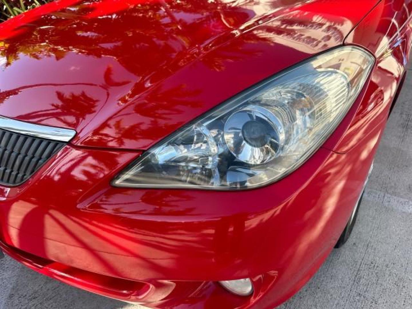 2004 Absolutely Red /Dark Stone Toyota Camry Solara 1 FL SLE LOW MILES 17,713 (4T1FA38P74U) with an 3.3L DOHC SMPI VVT-i 24-Valve V6 Engine engine, Automatic transmission, located at 4701 North Dixie Hwy, Pompano Beach, FL, 33064, (954) 422-2889, 26.240938, -80.123474 - OUR WEBPAGE FLORIDACARS1.COM HAS OVER 100 PHOTOS AND FREE CARFAX LINK 2004 TOYOTA CAMRY SOLARA SLE V6 VIN: 4T1FA38P74U024669 4 T 1 F A 3 8 P 7 4 U 0 2 4 6 6 9 CONVERTIBLE 3.3L V6 F DOHC 24V 29 MPG GASOLINE FRONT WHEEL DRIVE Top Features Alloy Wheels Leather Seats Front Seat Heaters Satellite Radio R - Photo#28