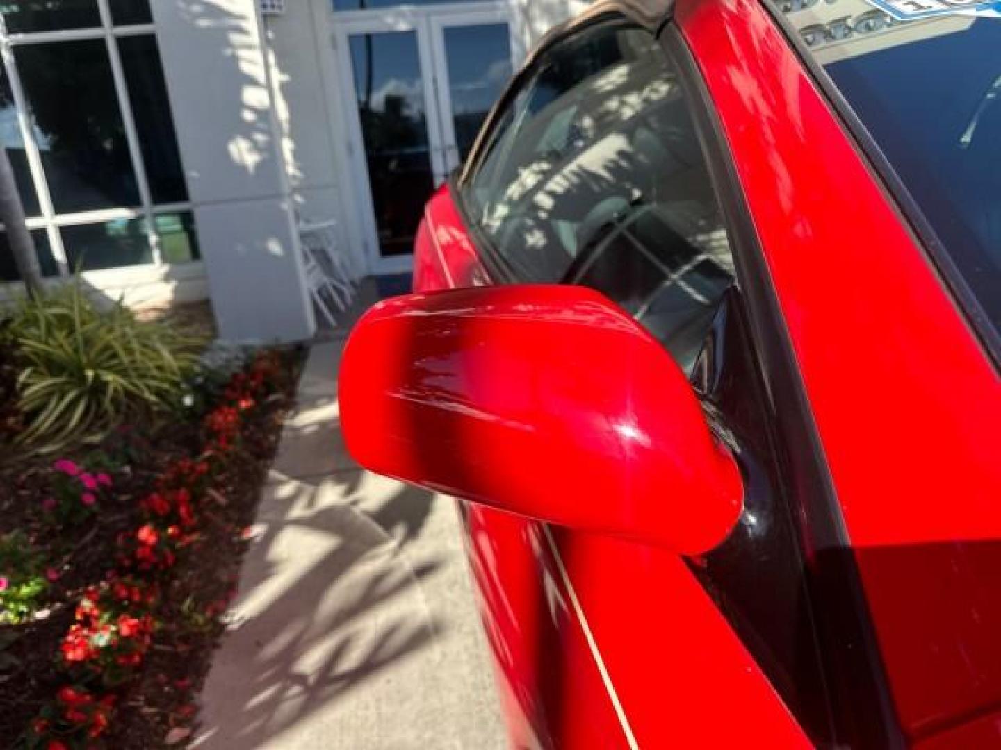 2004 Absolutely Red /Dark Stone Toyota Camry Solara 1 FL SLE LOW MILES 17,713 (4T1FA38P74U) with an 3.3L DOHC SMPI VVT-i 24-Valve V6 Engine engine, Automatic transmission, located at 4701 North Dixie Hwy, Pompano Beach, FL, 33064, (954) 422-2889, 26.240938, -80.123474 - OUR WEBPAGE FLORIDACARS1.COM HAS OVER 100 PHOTOS AND FREE CARFAX LINK 2004 TOYOTA CAMRY SOLARA SLE V6 VIN: 4T1FA38P74U024669 4 T 1 F A 3 8 P 7 4 U 0 2 4 6 6 9 CONVERTIBLE 3.3L V6 F DOHC 24V 29 MPG GASOLINE FRONT WHEEL DRIVE Top Features Alloy Wheels Leather Seats Front Seat Heaters Satellite Radio R - Photo#32
