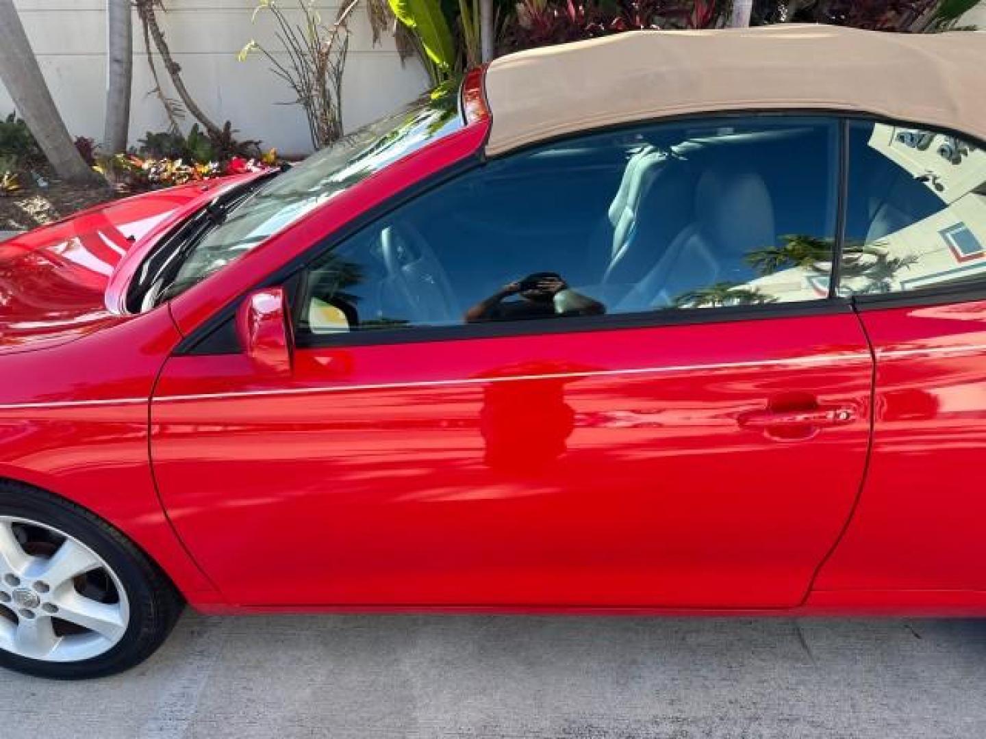 2004 Absolutely Red /Dark Stone Toyota Camry Solara 1 FL SLE LOW MILES 17,713 (4T1FA38P74U) with an 3.3L DOHC SMPI VVT-i 24-Valve V6 Engine engine, Automatic transmission, located at 4701 North Dixie Hwy, Pompano Beach, FL, 33064, (954) 422-2889, 26.240938, -80.123474 - OUR WEBPAGE FLORIDACARS1.COM HAS OVER 100 PHOTOS AND FREE CARFAX LINK 2004 TOYOTA CAMRY SOLARA SLE V6 VIN: 4T1FA38P74U024669 4 T 1 F A 3 8 P 7 4 U 0 2 4 6 6 9 CONVERTIBLE 3.3L V6 F DOHC 24V 29 MPG GASOLINE FRONT WHEEL DRIVE Top Features Alloy Wheels Leather Seats Front Seat Heaters Satellite Radio R - Photo#35