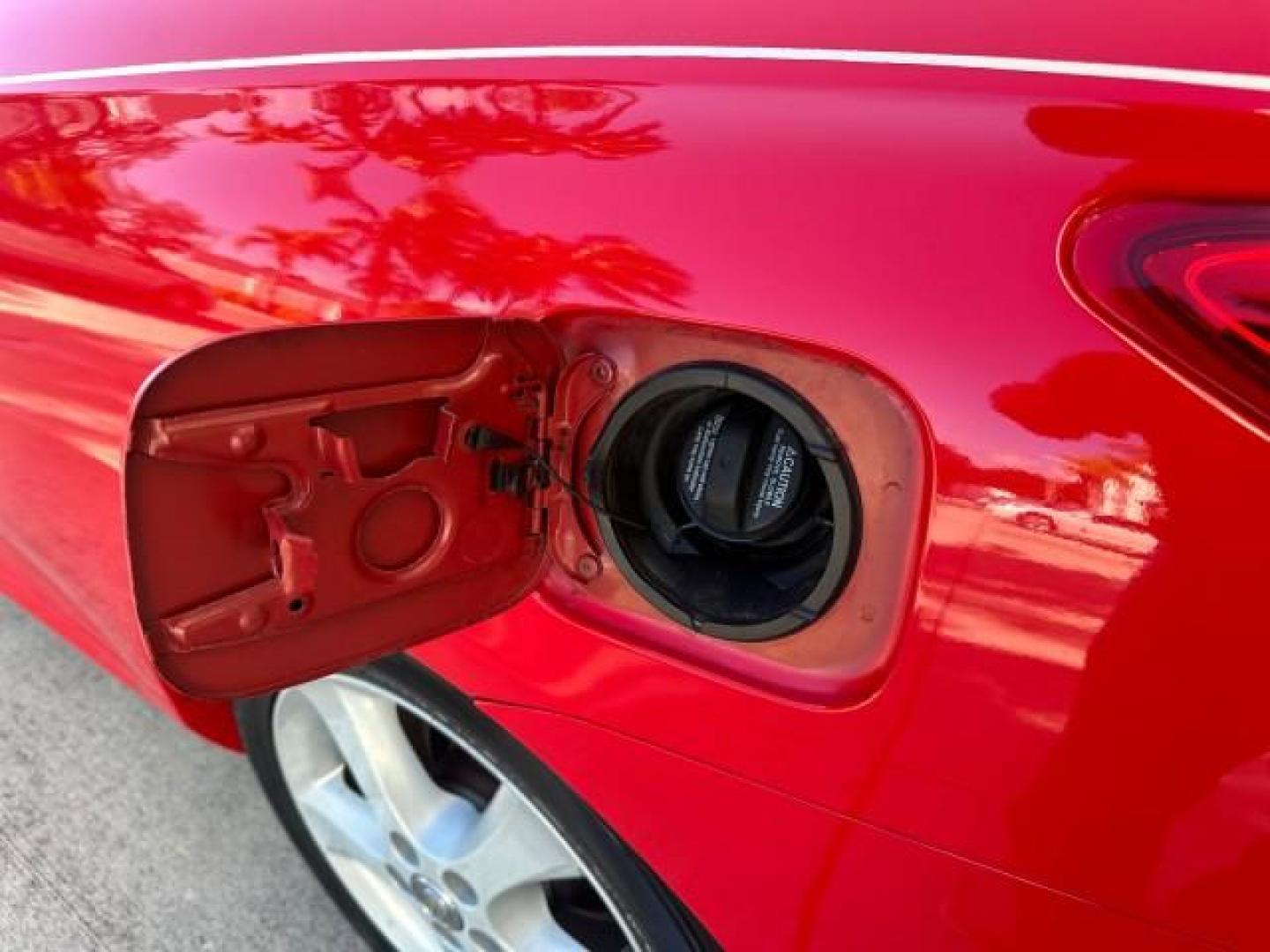 2004 Absolutely Red /Dark Stone Toyota Camry Solara 1 FL SLE LOW MILES 17,713 (4T1FA38P74U) with an 3.3L DOHC SMPI VVT-i 24-Valve V6 Engine engine, Automatic transmission, located at 4701 North Dixie Hwy, Pompano Beach, FL, 33064, (954) 422-2889, 26.240938, -80.123474 - OUR WEBPAGE FLORIDACARS1.COM HAS OVER 100 PHOTOS AND FREE CARFAX LINK 2004 TOYOTA CAMRY SOLARA SLE V6 VIN: 4T1FA38P74U024669 4 T 1 F A 3 8 P 7 4 U 0 2 4 6 6 9 CONVERTIBLE 3.3L V6 F DOHC 24V 29 MPG GASOLINE FRONT WHEEL DRIVE Top Features Alloy Wheels Leather Seats Front Seat Heaters Satellite Radio R - Photo#38